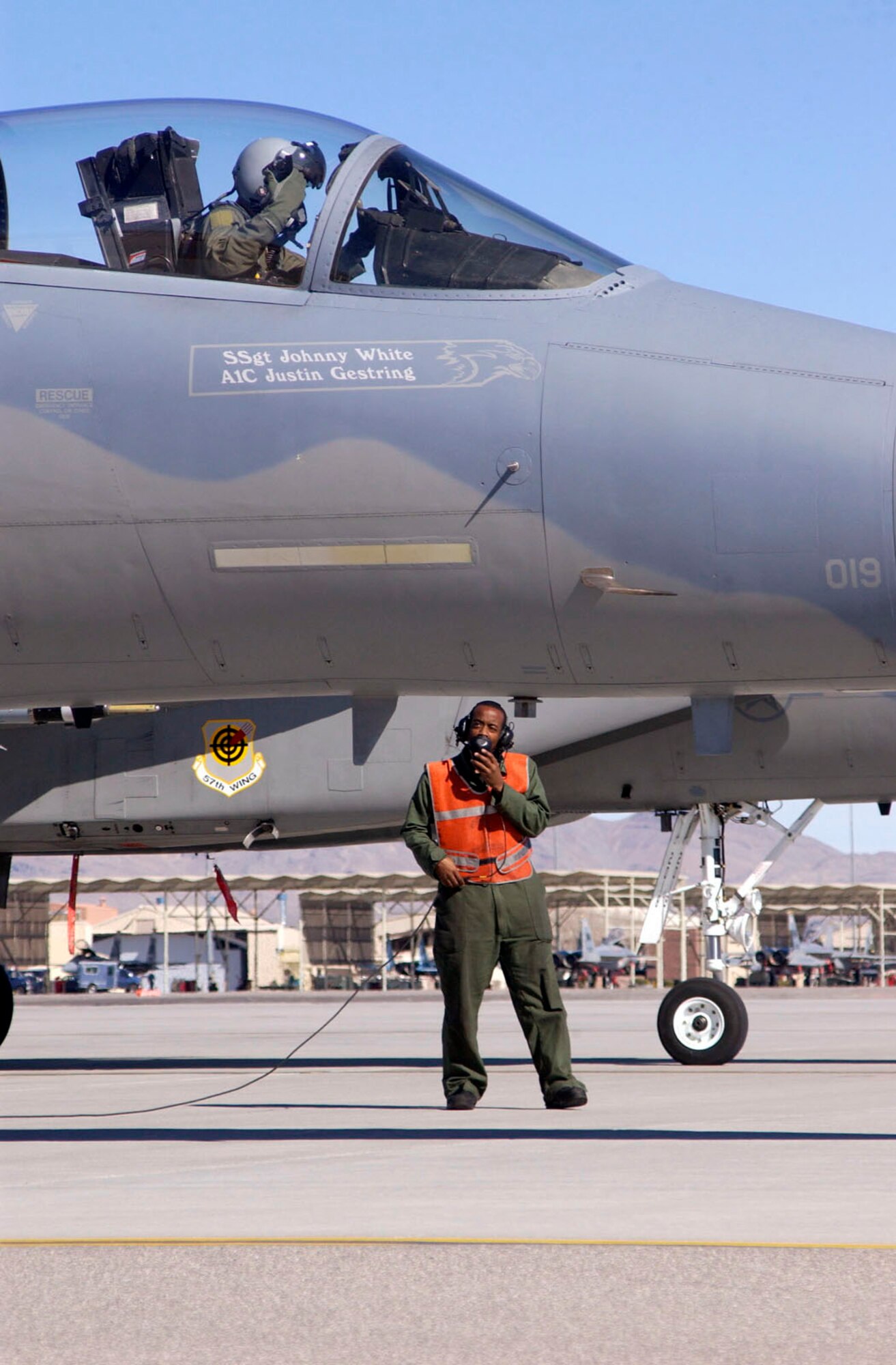 NELLIS AIR FORCE BASE, Nev.—An F-15 Aggressor receives a preflight “last chance” inspection at Red Flag 08-2.2 here Feb. 12. The Aggressors simulate enemy tactics as they try to shoot down the “Blue Forces.” Red Flag is a multi-national exercise providing pilots with a realistic environment to practice combat scenarios. The experience gained during Red Flag is vital to the survival of pilots in combat. (U.S. Air Force photo by Airman 1st Class Ryan Whitney)