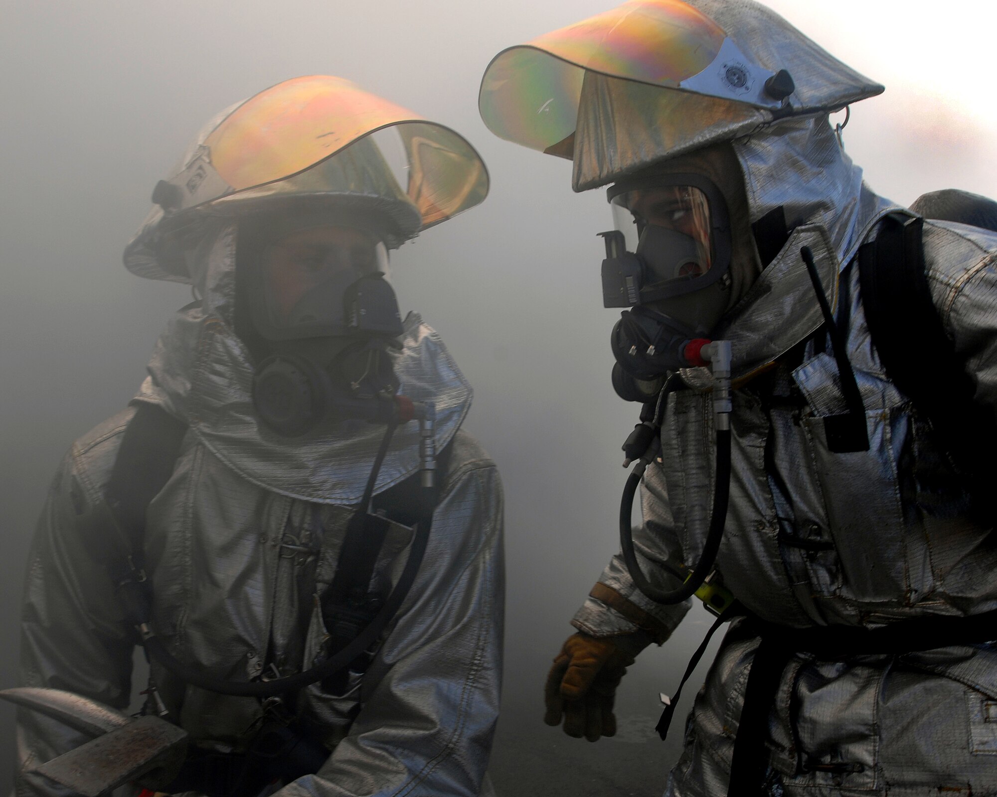 More than 20 Ramstein firefighters participate in a mass casualty exercise Feb. 11 here. The scenario involved victims trapped in a burning building. Photo by Airman 1st Class Kenny Holston