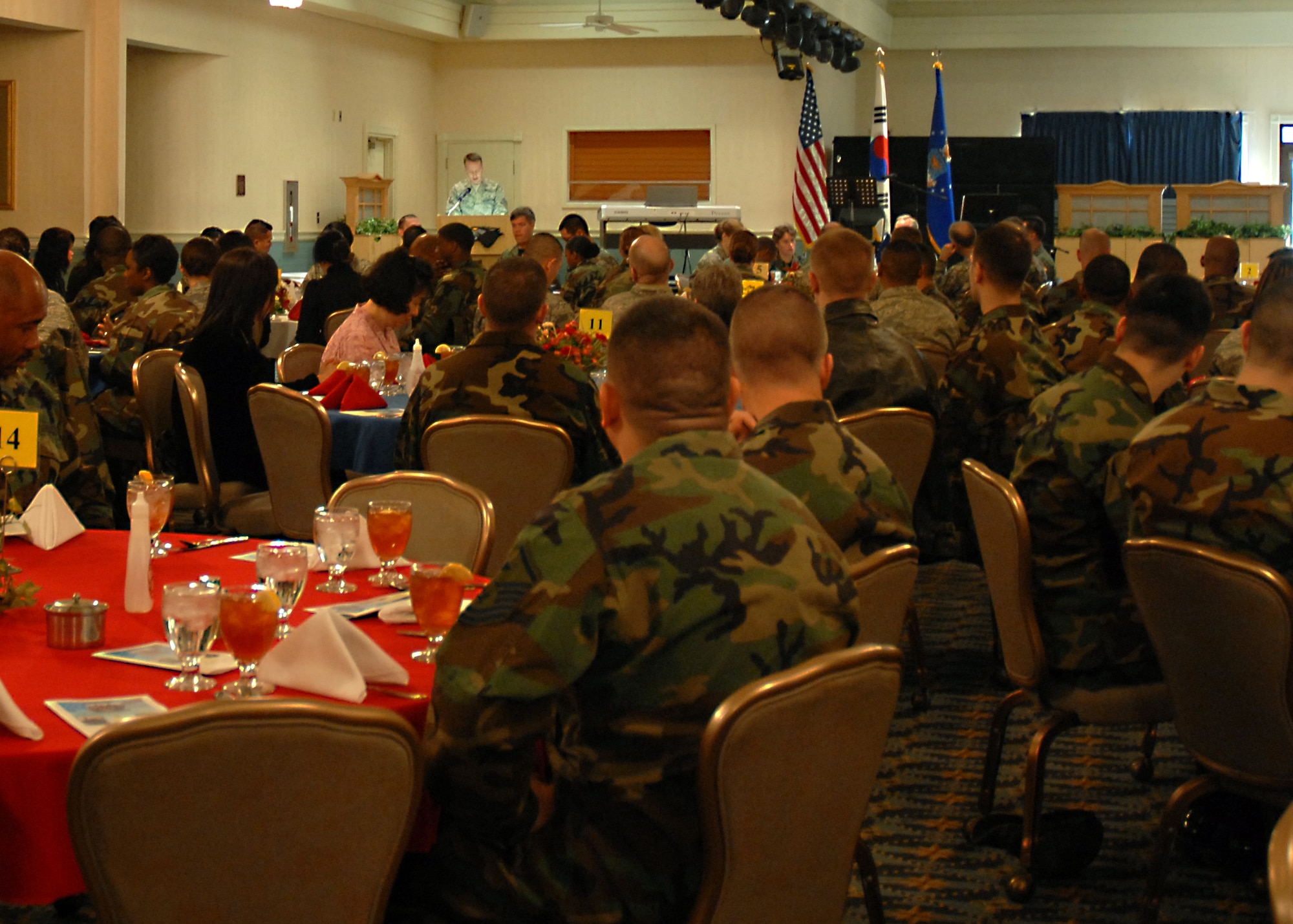 KUNSAN AIR BASE, South Korea—  Airmen from the 8th Fighter Wing gather together for The National Prayer Luncheon Feb. 21 here. The National Prayer Luncheon is a way for Airmen to assemble together in efforts to understand the need for prayer in their lives as well as getting a better understanding and greater appreciation for different religious beliefs. (U.S. Air Force Photo/Staff Sgt Araceli Alarcon) 