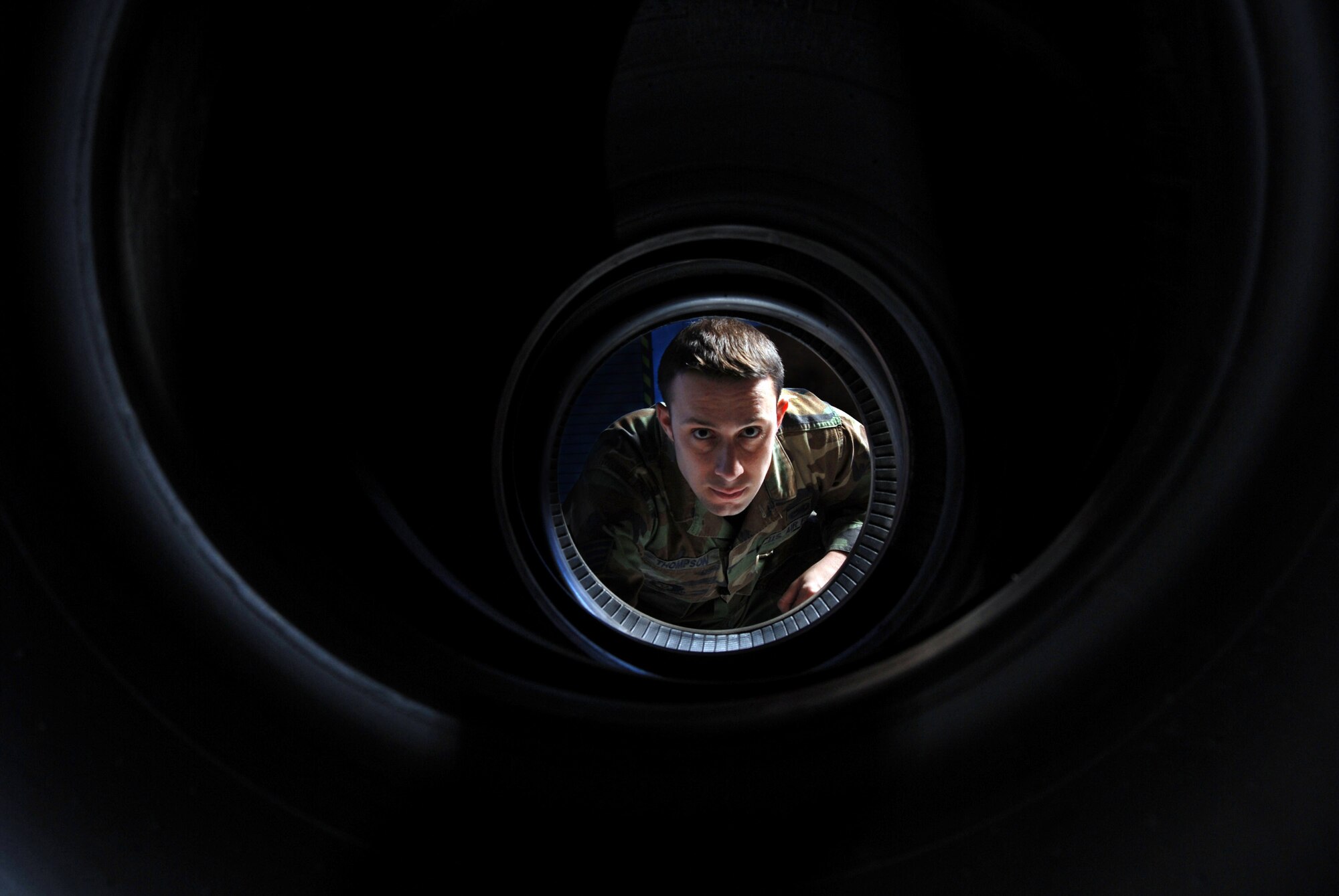 Staff Sgt. Greg Thompson, an aircraft mechanic from the Aero Repair Shop, visually inspect the bead area of a C-17 Globemaster III cargo aircraft nose landing gear tires at March Air Reserve Base, Calif., on Feb. 3, 2008. March Air Reserve Base, located in Southern California, is home to the largest air mobility wing in the Air Force Reserve Command. It is also home to units from the Army Reserve, Navy Reserve, Marine Corps Reserve and Air National Guard. (U.S. Air Force photo by Val Gempis)