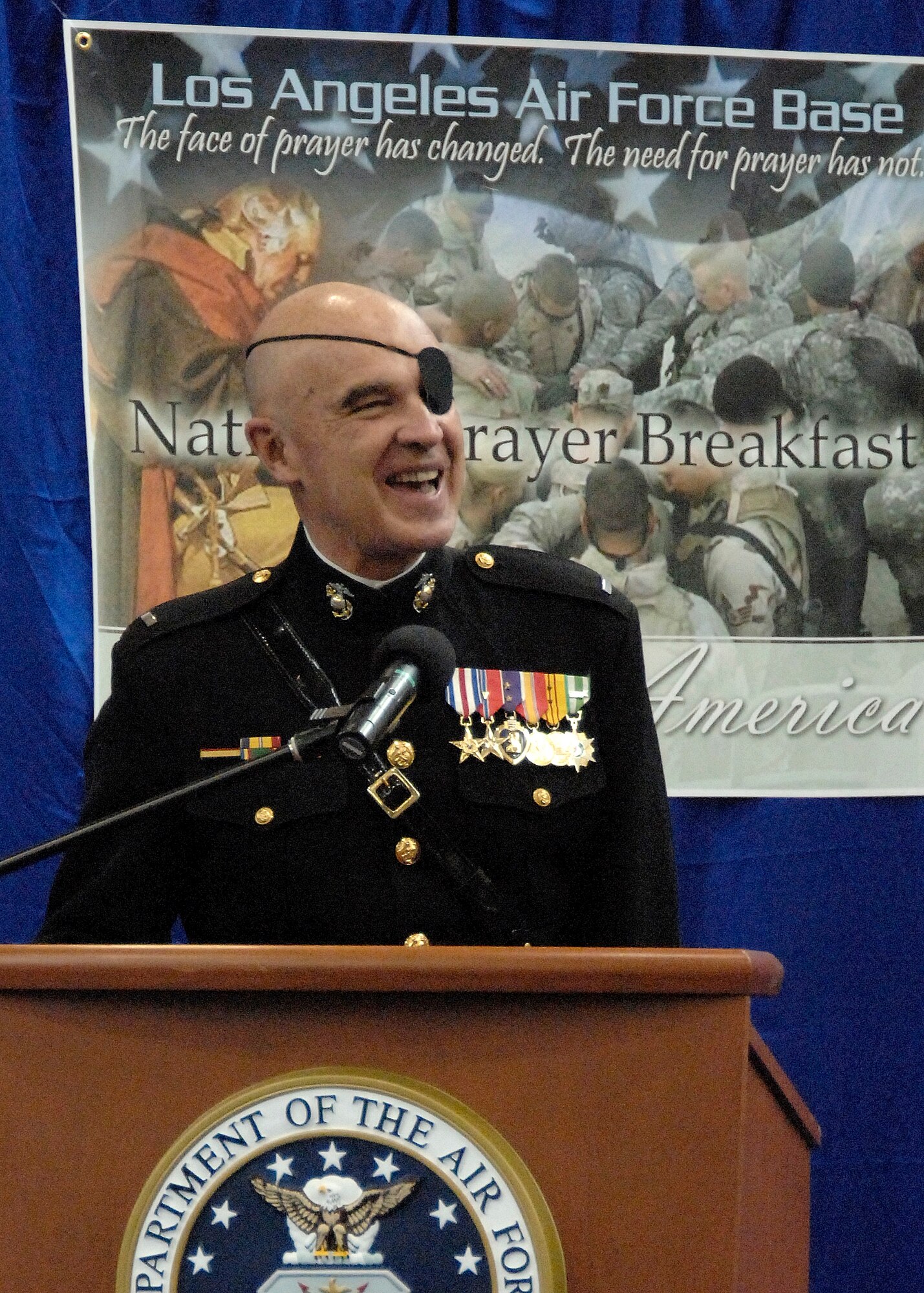 Clebe McClary spoke at Los Angeles AFB’s annual National Prayer Breakfast, Feb. 13.  As a young Marine lieutenant serving in Vietnam, he was critically wounded on a reconnaissance mission in 1968.   After undergoing more than 30 operations and countless hours of physical therapy, he rebuilt his life. Currently, he travels the country as a motivational speaker. (Photo by Lou Hernandez)