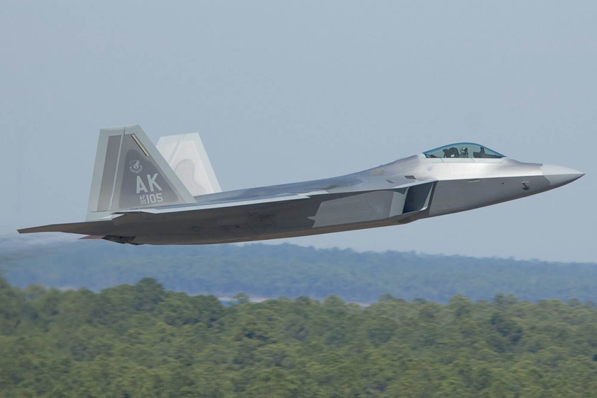 TYNDALL AIR FORCE BASE, Fla. -- A 90th Fighter Squadron F-22 takes part in Combat Archer, an assessment conducted to prepare and evaluate operational fighter squadron's readiness for combat operations. The 3rd Wing and Air Force Reserve Command's 477th Fighter Group combined for its first F-22A Raptor deployment to Tyndall Air Force Base, Fla., for Combat Archer. The successful integration of both reserve and active-duty Airmen was showcased Feb. 2-17, when approximately eight aircraft and 132 Airmen took part in the Weapons System Evaluation Program training. (Photo by Scott Wolfe)