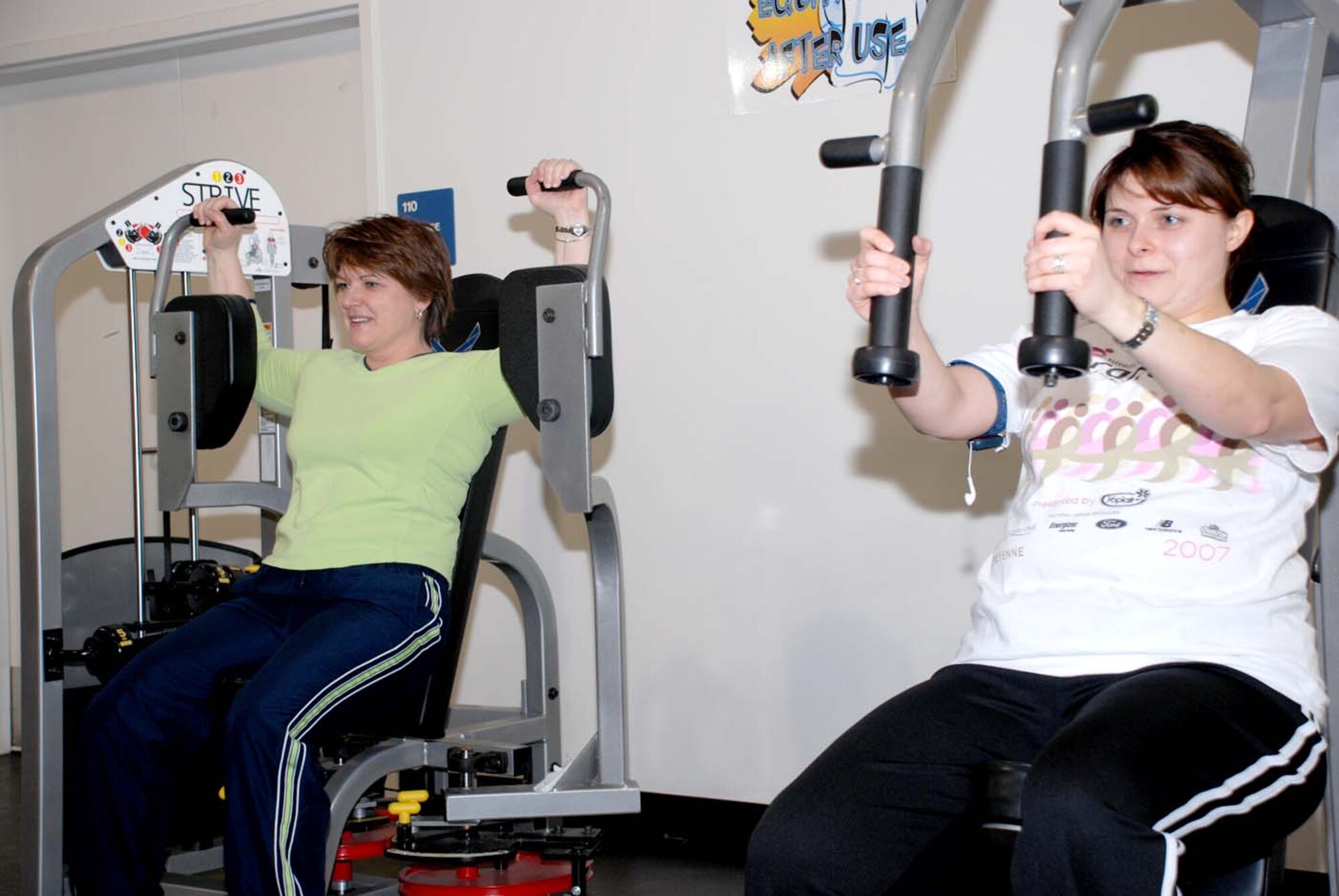 Marie Leo and Kathryn Lasky work out at the base fitness center Feb. 5. Mrs. Leo is the spouse of Chief Master Sgt. Al Leo, 90th Maintenance Operations Squadron. Mrs. Lasky is the spouse of Staff Sgt. Nicholas Lasky, 90th Maintenance Group (U.S. Air Force photo/Airman 1st Class Daryl Knee).
