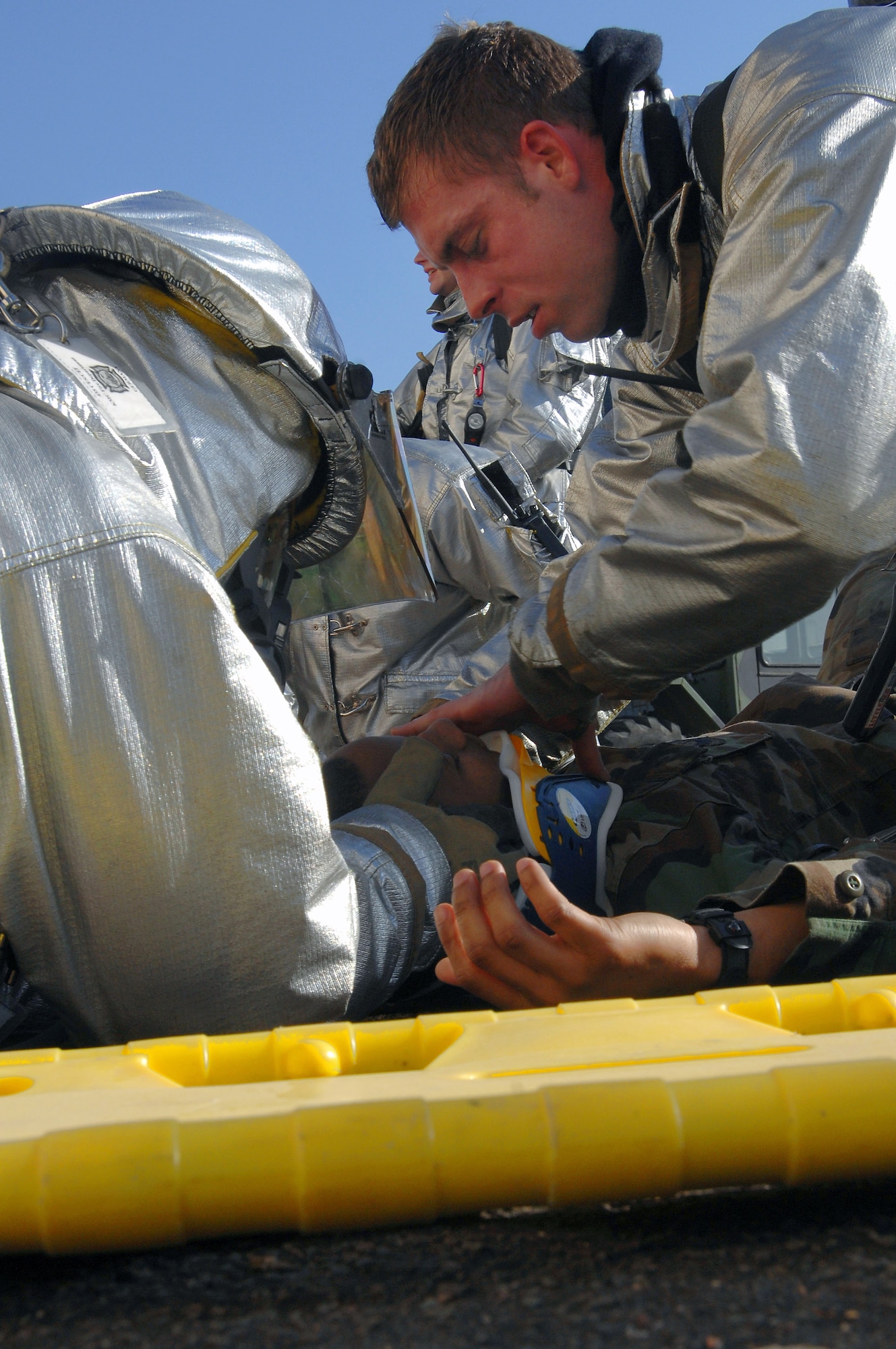 Firefighters participate in a mass casualty exercise Feb. 11 at Ramstein Air Base, Germany. The scenario involved 23 firefighters working to save victims trapped in a burning building. The victims consisted of 20 volunteers from the First Term Airman's Center. (U.S. Air Force photo/Airman 1st Class Kenny Holston)