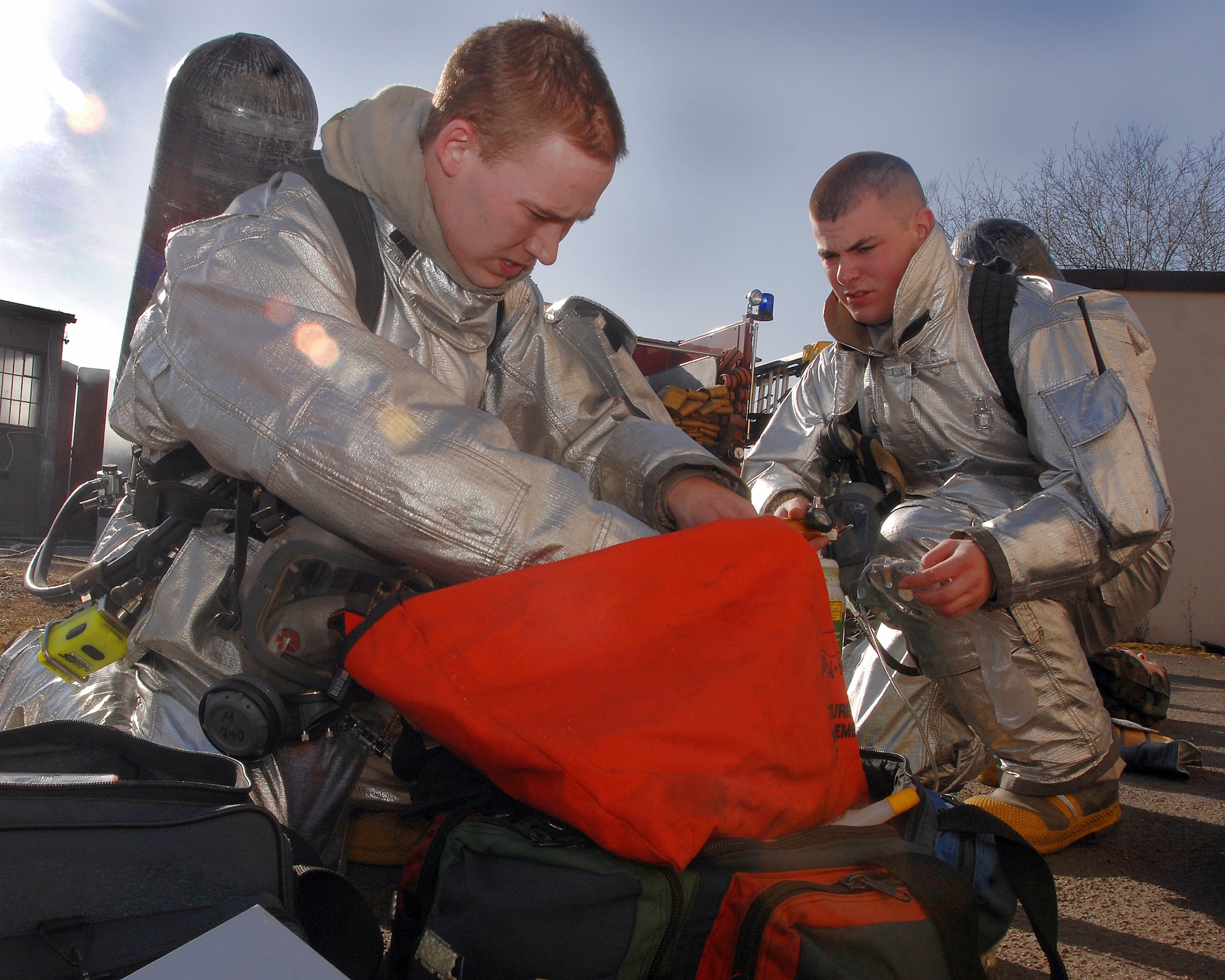 Firefighters participate in a mass casualty exercise Feb. 11 at Ramstein Air Base, Germany. The scenario involved victims trapped in a burning building. (U.S. Air Force photo/Airman 1st Class Kenny Holston)
