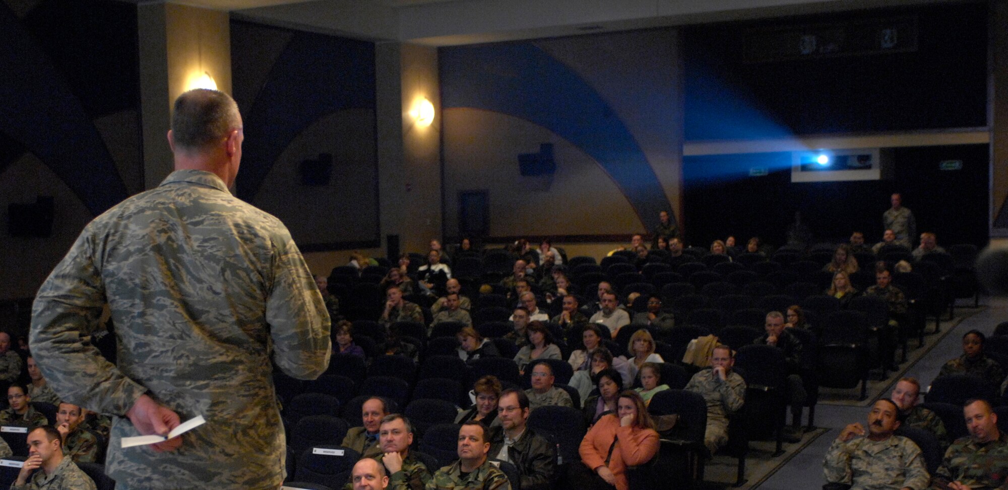 AVIANO AIR BASE, Italy -- Brig. Gen. Craig Franklin, 31 Fighter Wing, Commander, answers questions about base childcare services during the inaugural Town Hall Meeting at Aviano Air Base, Feb. 19, 2008.  The Town Hall Meeting allows Aviano Airmen and their families to voice their concerns to the Commander and other senior leadership directly. (U.S. Air Force photo/Senior Airman Michael S. Dorus)