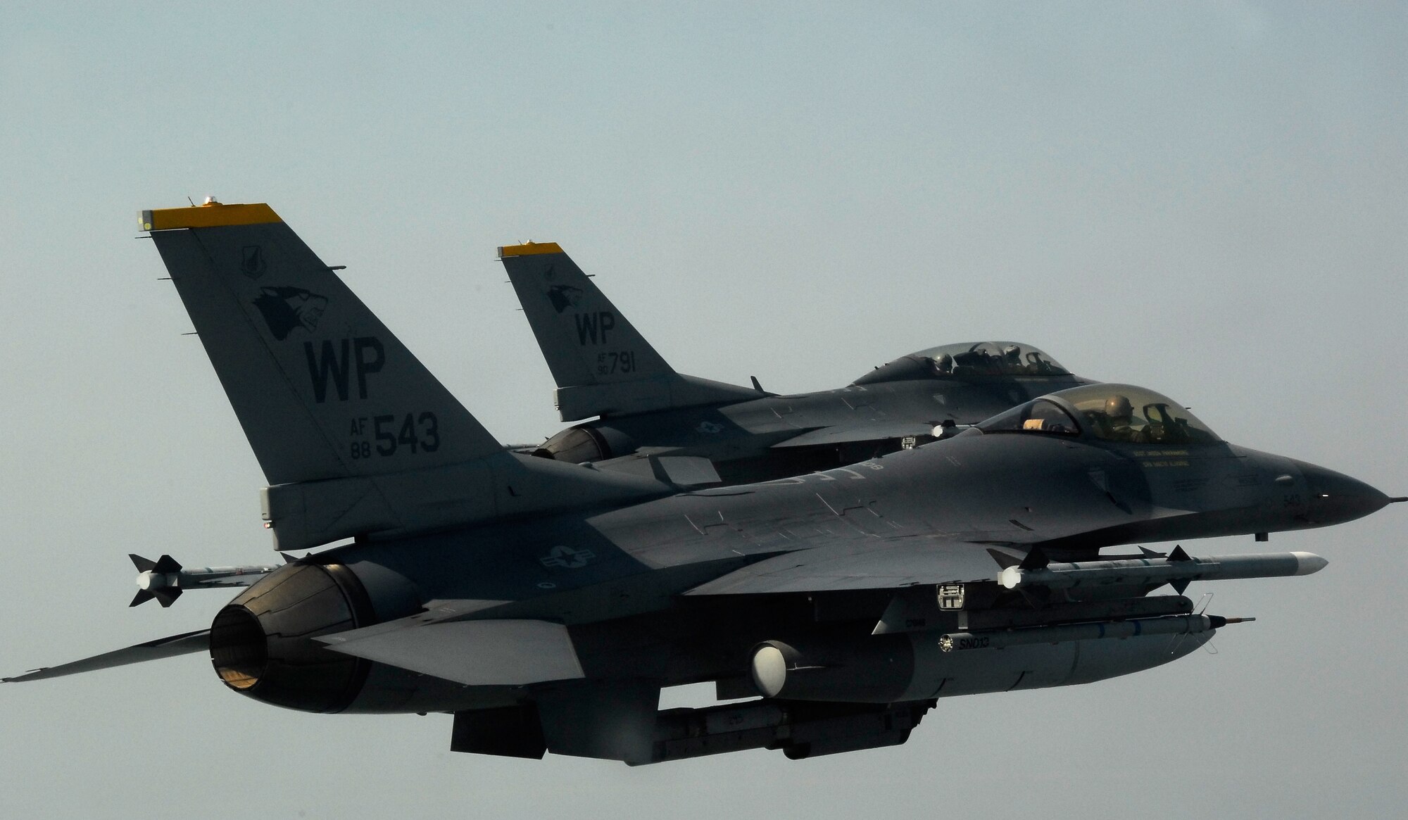 KUNSAN AIR BASE, South Korea -- Pilots from the 80th Fighter Squadron fly a training mission over the South Korean peninsula in F-16 Fighting Falcons, Feb 20. Pilots assigned to the 80th FS utilize training missions to simulate actual conditions they may face in combat and keep their war-fighting skills honed. (U.S. Air Force Photo/Tech. Sgt Quinton T. Burris)