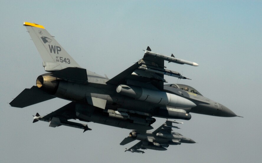 KUNSAN AIR BASE, South Korea -- Pilots from the 80th Fighter Squadron fly a training mission over the South Korean peninsula in F-16 Fighting Falcons, Feb 20. Pilots assigned to the 80th FS utilize training missions to simulate actual conditions they may face in combat and keep their war-fighting skills honed. (U.S. Air Force Photo/Tech. Sgt Quinton T. Burris)