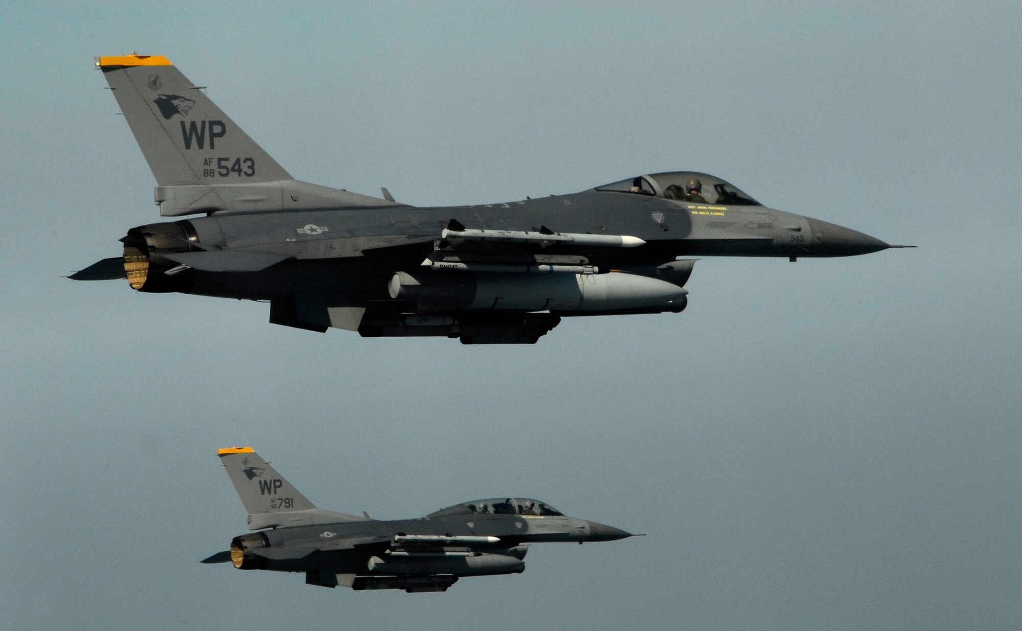 KUNSAN AIR BASE, South Korea -- Pilots from the 80th Fighter Squadron fly a training mission over the South Korean peninsula in F-16 Fighting Falcons, Feb 20. Pilots assigned to the 80th FS utilize training missions to simulate actual conditions they may face in combat and keep their war-fighting skills honed. (U.S. Air Force Photo/Tech. Sgt Quinton T. Burris)