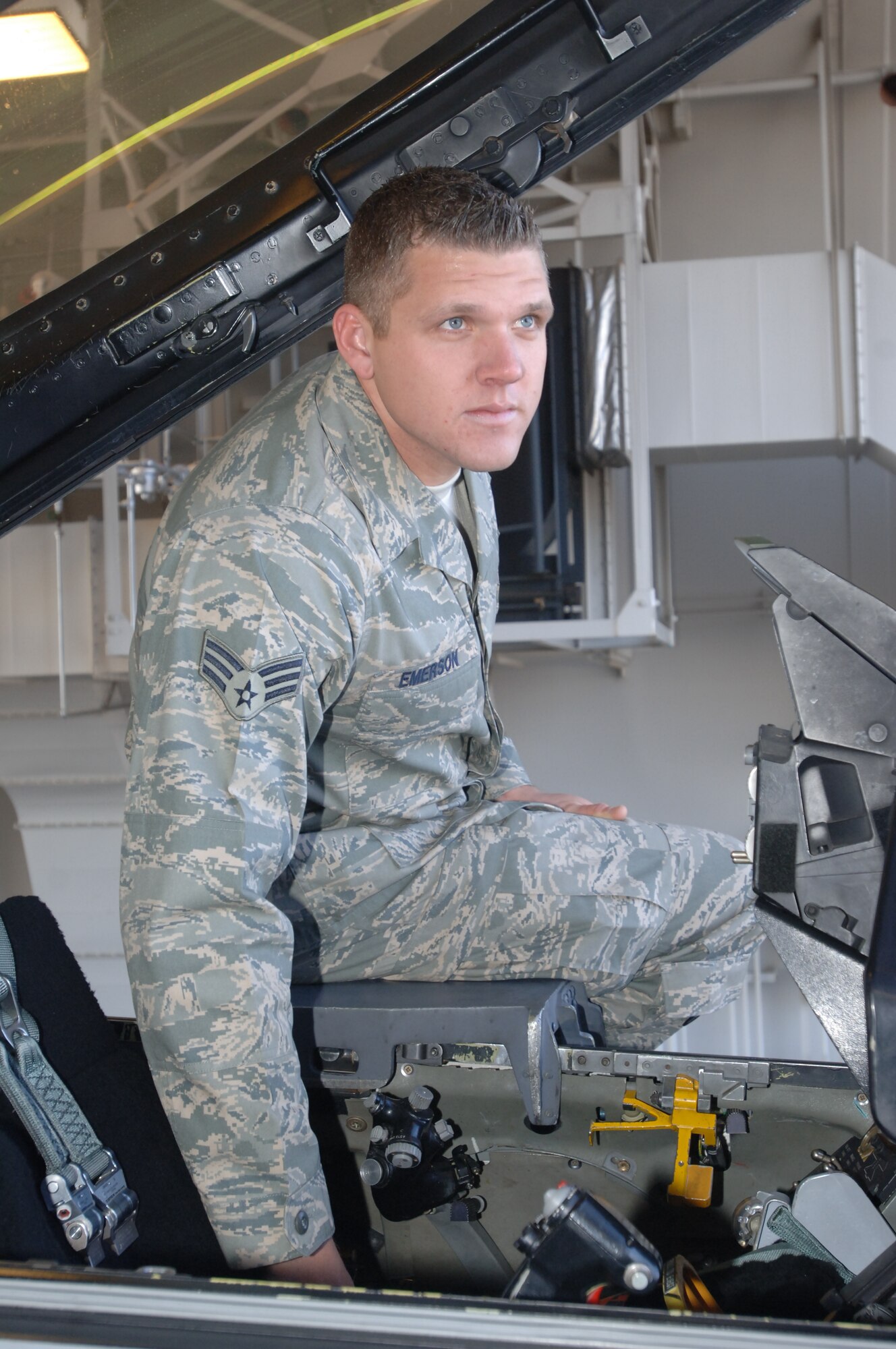 MISAWA AIR BASE, Japan -- Senior Airman Brian Emerson, 35th Aircraft Maintenance Squadron crew chief, inspects the cockpit of an F-16 here on Feb. 20, 2008.  Airman Emerson was recently selected to join the U.S. Air Force Thunderbirds. (U.S. Air Force photo by Senior Airman Robert Barnett)