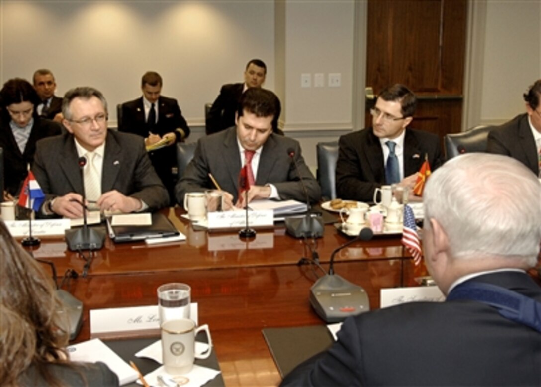 Croatian Minister Branko Vukelic (left), Albanian Minister Fatmir Mediu (center) and Macedonian Minister Lazar Elunovski meet with Secretary of Defense Robert M. Gates (foreground) for regional security discussions in the Pentagon on Feb. 19, 2008.  