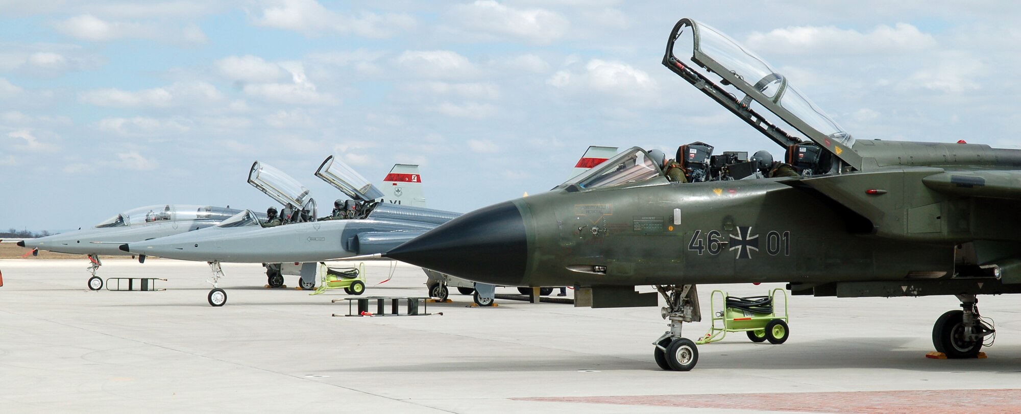 LAUGHLIN AIR FORCE BASE, Texas – A German Tornado aircraft sits on the flightline here next to a pair of T-38s from the 434th Fighter Training Squadron Feb. 19.  The German aircrew who brought the plane to Laughlin participated in the first-ever training program with instructor pilots from the 434th Fighter Training Squadron that included mock dogfights.    (U.S. Air Force photo by 2nd Lt. Chris Cochran)