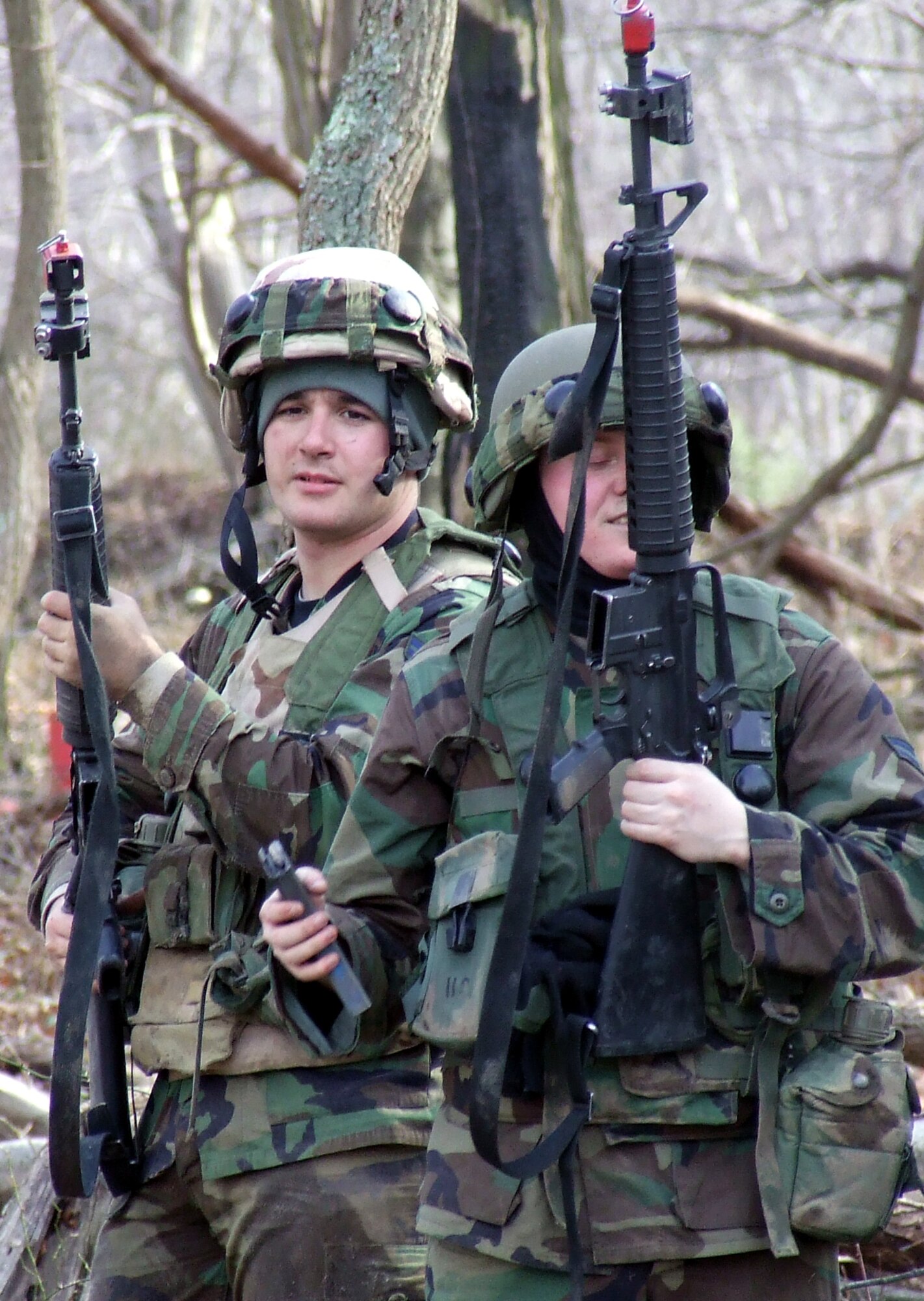 Students in the Advanced Contingency Skills Training Course 08-2A unload their weapons of its blank ammunition after completing a day of training on a range on Fort Dix, N.J., Feb. 15, 2008.  The course, taught by the U.S. Air Force Expeditionary Center's Expeditionary Operations School and 421st Combat Training Squadron, prepares Airmen from multiple career fields in expeditionary combat basic skills such as convoy operations, tactics and combat first aid prior to deployment.  (U.S. Air Force Photo/Tech. Sgt. Scott T. Sturkol)