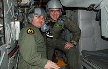 MINOT AIR FORCE BASE, N.D. -- Lt. Col. Shawn Fleming, chief of standardization and evaluation with the 5th Operations Group, and Maj. Steve Benning, deputy chief of standardization and evaluation with the 5th Operations Group, pose for a picture inside the cockpit of a B-52H Stratofortress during their final flight here Feb. 19. Both men are retiring after serving a combined 42 years in the Air Force.(courtesy photo)