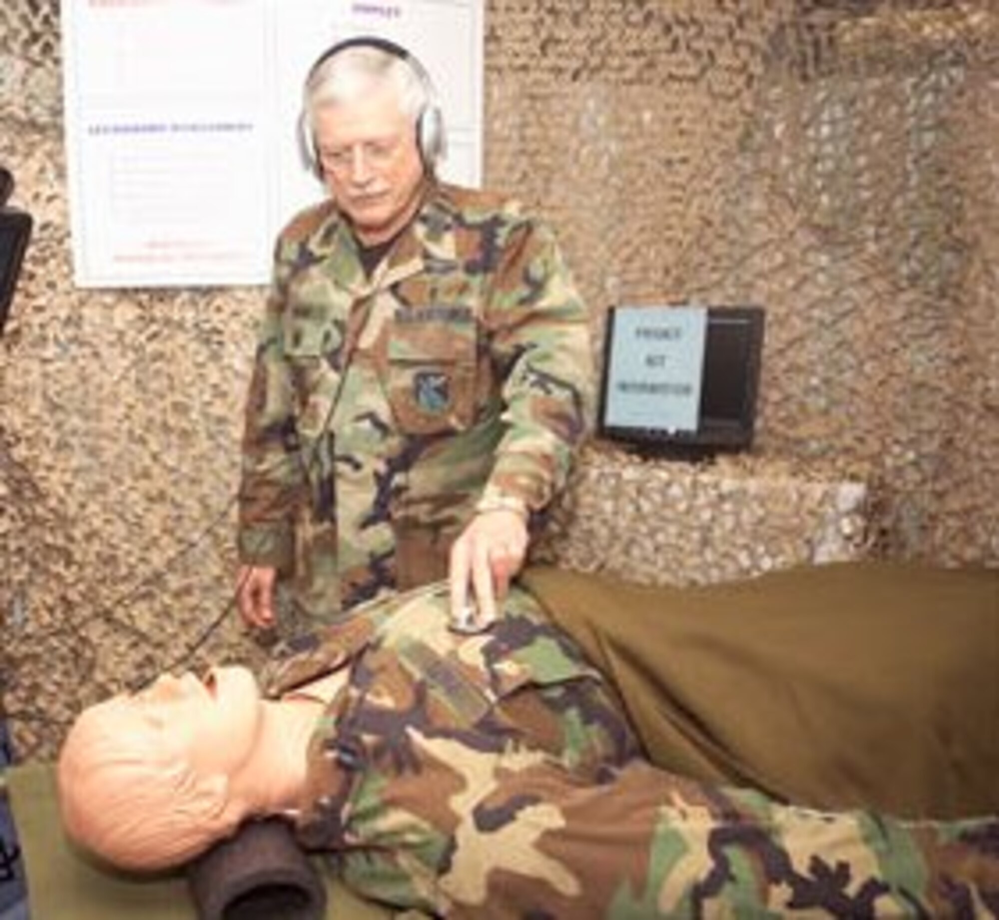 Col. Paul Morr demonstrates techniques using Medi-Man, called Capt. Patt.  (Courtesy photo)