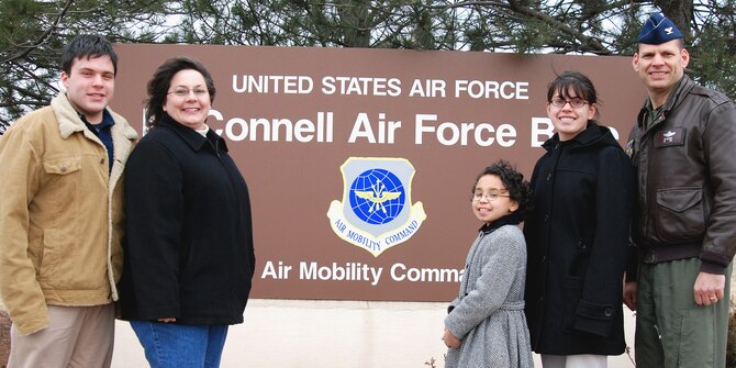 Col. James Vechery, 22nd Air Refueling Wing commander stands with his family, left to right, son, Sterner, wife, Robin and daughters Mari, and Taylor. (courtesy photo) 
