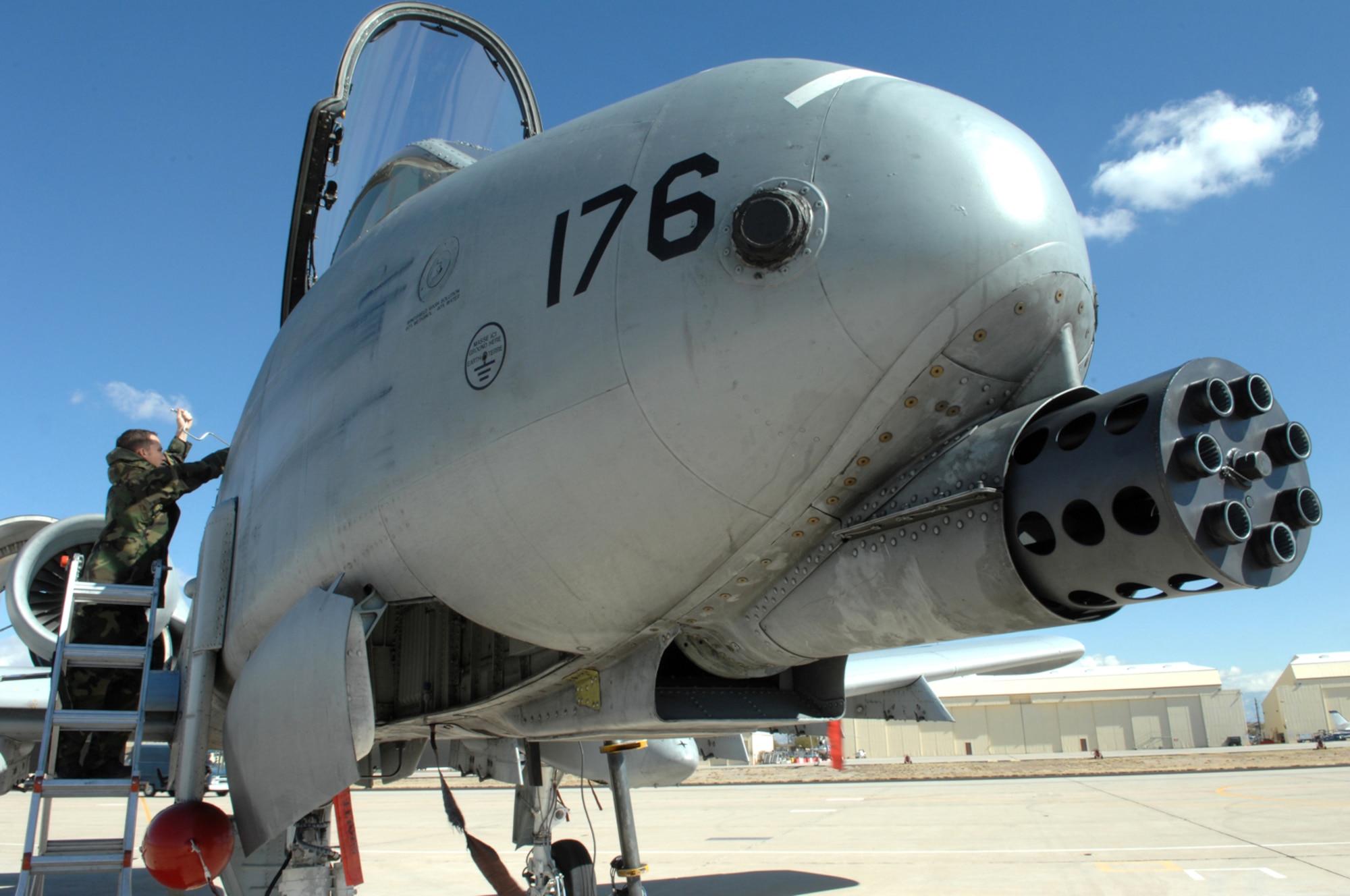 Senior Airman James Greer, 355th Aircraft Maintenance Squadron, removes a side panel of a A-10 Thunderbolt at Davis-Monthan AFB, Arizona, on Feb. 5. (U.S. Air Force photo by Airman 1st Class Noah R. Johnson)