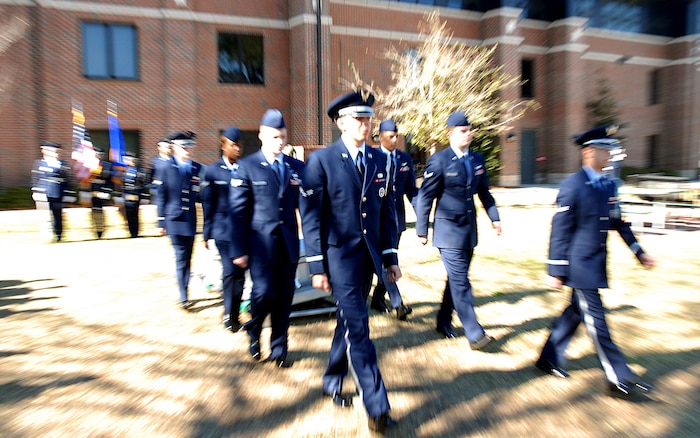 Graduating and current Honor Guard members complete their mock burial ceremony at the Charleston AFB Honor Guard graduation at the 437th Services Squadron headquarters building on Charleston AFB.  (U.S. Air Force photo/Staff Sgt. Jennifer Arredondo)