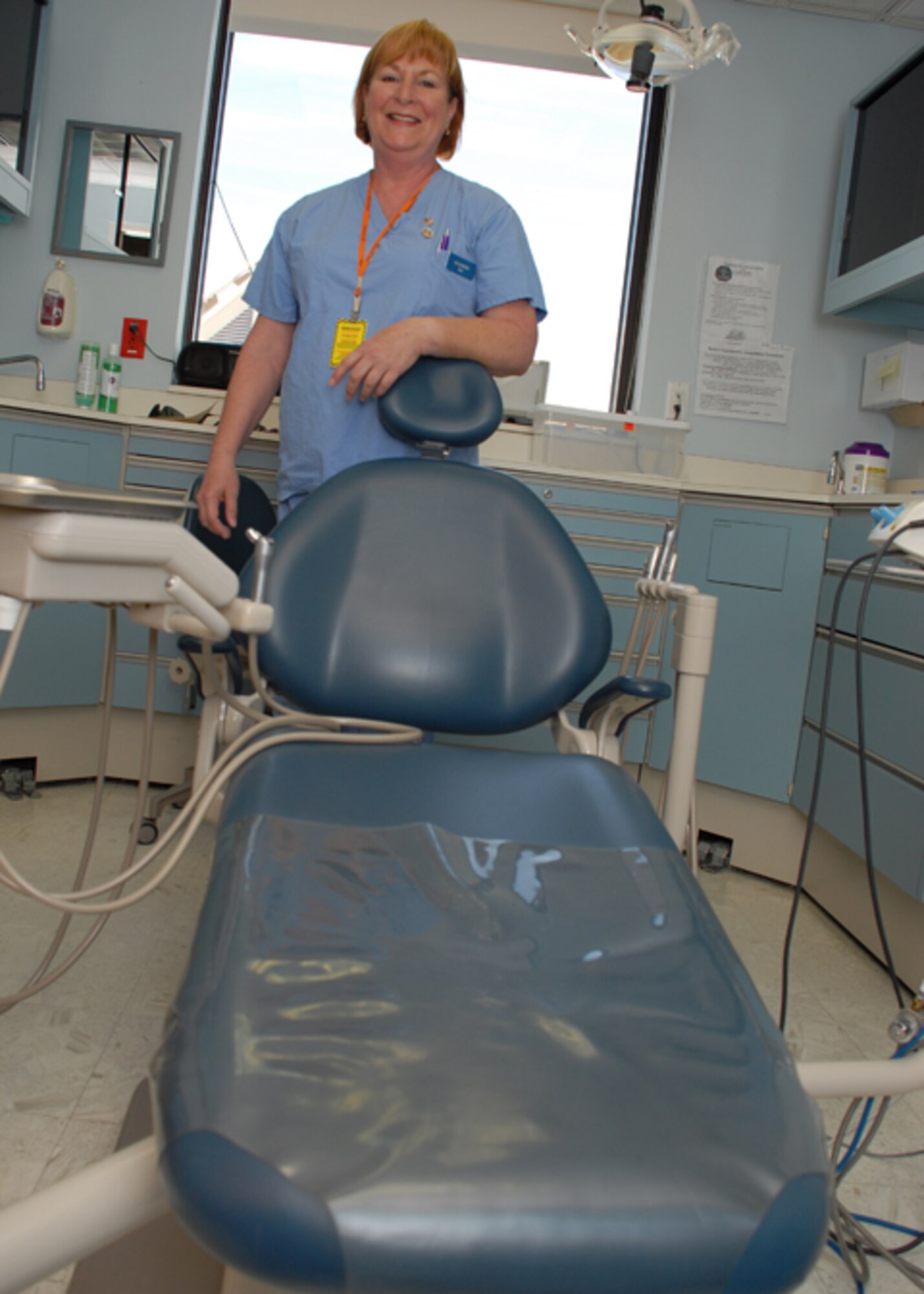 EGLIN AIR FORCE BASE, Fla. -- Jo Lowery, 96th Dental Squadron hygienist, was recently awarded Civilain of the Year Category III for her dedication and professionalism on and off duty. Throughout the year, she performed more than 1,000 cleanings, out producing the next dental technician by 54 percent. Among her many accomplishments, she learned sign language to communicate with a co-worker, improving clinic relations. (U.S. Air Force photo by Staff Sgt. Mike Meares)