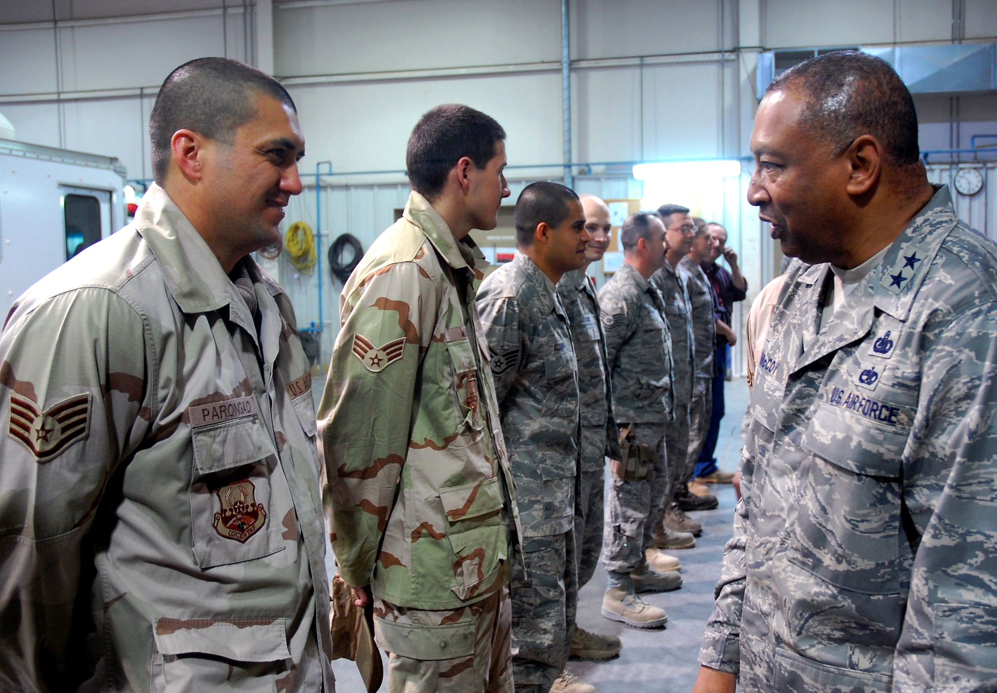 Maj. Gen. Gary T. McCoy, director of logistics readiness for the office of the deputy chief of staff for logistics, talks with Staff Sgt. Brandon Parongao Feb. 16 during his visit to an air base in Southwest Asia.  Sergeant Parongao works at the 386th Air Expeditionary Logistics Readiness Squadron's vehicle maintenance facility and is deployed from Spangdahlem Air Base, Germany. The general's visit was the last stop on a tour of five bases in the Central Command area of operations. (U.S. Air Force photo/Capt. Jason McCree) 