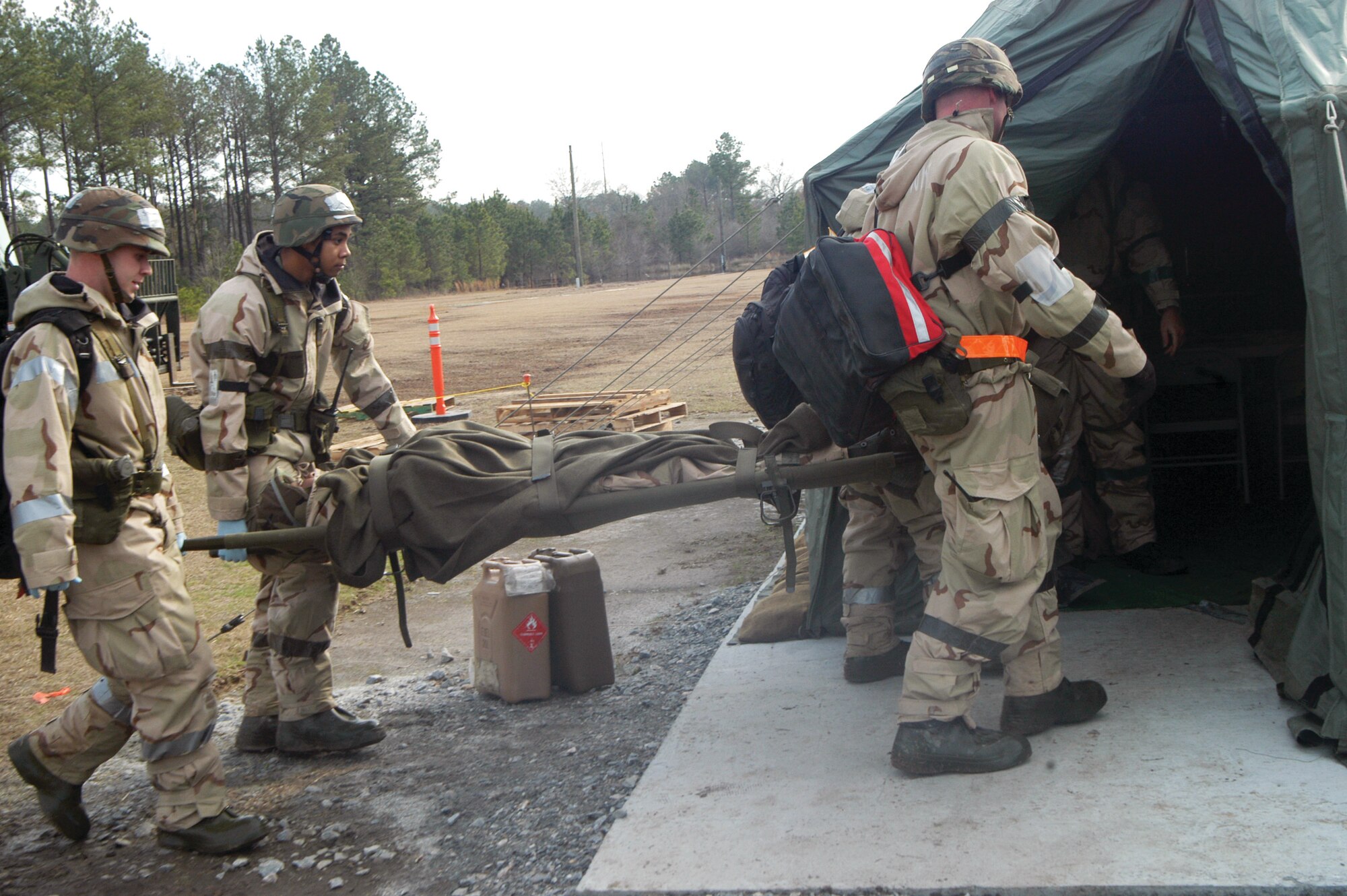 A "victim" of an attack is transported to a tent during the  5th Combat Communications Group  exercise Jan. 18. The exercise was part of the group's preparation for this week's ORI.  U. S. Air Force photo by Sue Sapp 