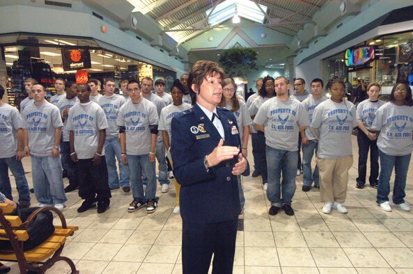 Brig Gen. Suzanne Vautrinot speaks to family members and onlookers at the Galleria Mall Feb. 19 before swearing in 25 new Air Force recruits. U. S. Air Force photo by Sue Sapp  
