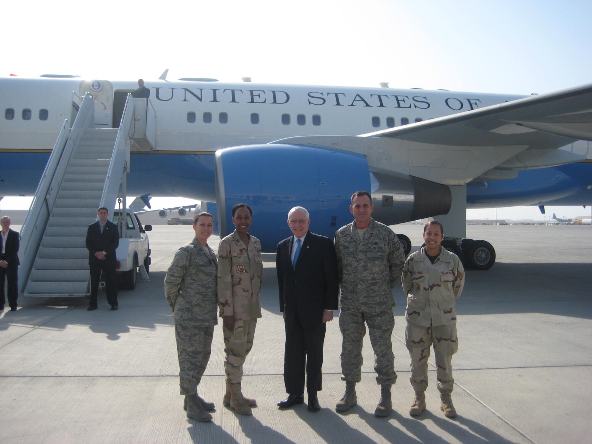 SOUTHWEST ASIA -- United States Attorney General Michael Mukasey (center), meets Captain Cami L. Johnson (second from the left), Deputy Director for the Joint Basing-Program Integration Office, 305th Air Mobility Wing, during the U.S. Attorney General's visit to an air base in the Persian Gulf Region during February 2008.  