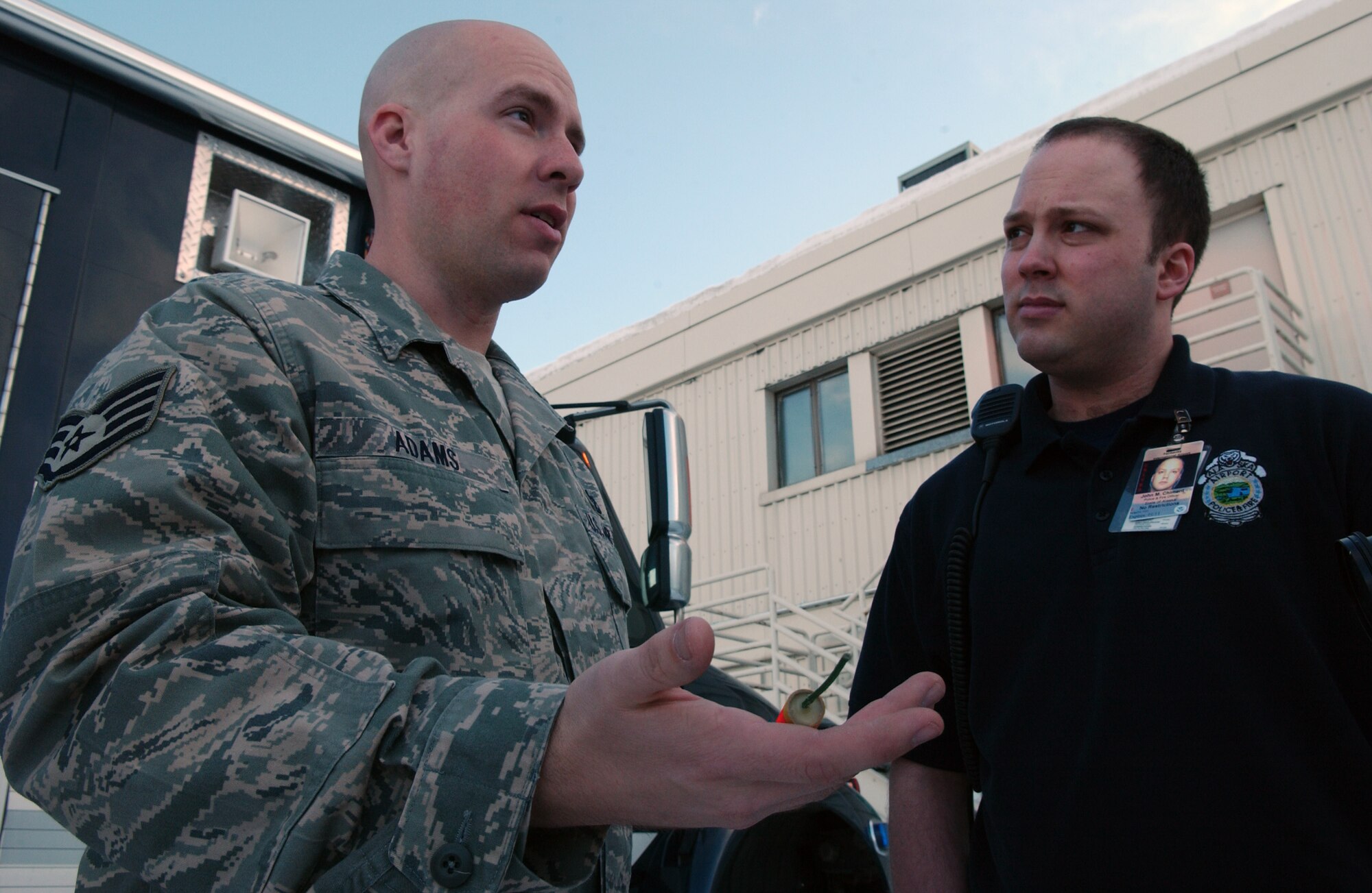 EIELSON AIR FORCE BASE, Alaska -- Staff Sgt. Christopher Adams explains the results of a suspected improvised explosive device X-ray which was a normal blasting cap wrapped in tissue paper and electrical tape on Feb. 21, in Fairbanks. The 354th Civil Engineer Squadron Explosive Ordnance Disposal shop responded to a call from a state trooper that confiscated a suspected IED and ammunition from a local in Fairbanks. Eielson EOD is the only unit in central Alaska with explosive ordnance disposal capabilities. (U.S. Air Force Photo/Airman 1st Class Jonathan Snyder)