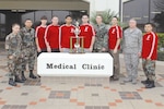 The 12th Medical Group shows off the trophy for winning the Randolph flag football title Feb. 13. The Medic Warriors completed an undefeated season by defeating AETC/CSS, 31-6, in the championship game. (Photo by Don Lindsey)