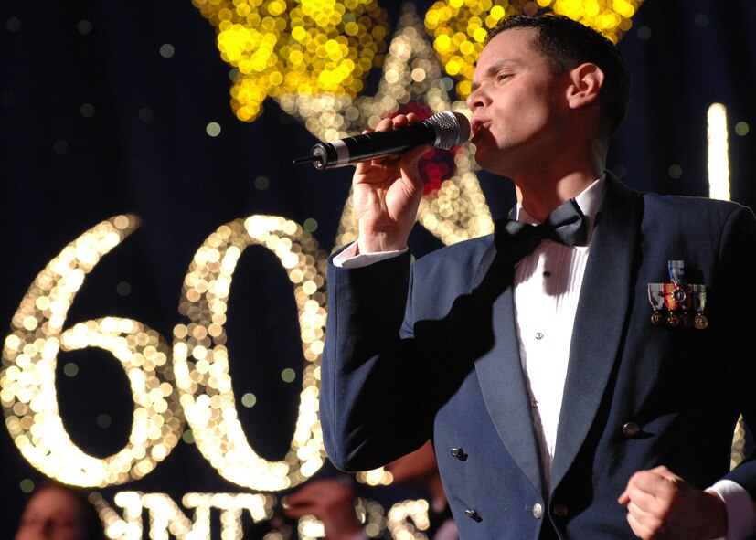 BARKSDALE AIR FORCE BASE, La.- Staff Sgt. Daniel Rutherford, 22d Intelligence Squadron, sings during the finale of the Tops in Blue show held at Hoban Hall here on Feb. 7.(U.S. Air Force photo by Airman 1st Class Joanna M. Kresge)
