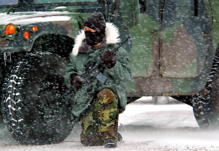 Senior Airman Shareen Blas takes up her position during security training Feb. 13 at a missile site training area on Minot Air Force Base, N.D.  Airman Blas and members of the North Dakota Air National Guard's 119th Wing in Fargo receive missile site defense training on a regular basis. (U.S. Air Force photo/Senior Master Sgt. David H. Lipp)