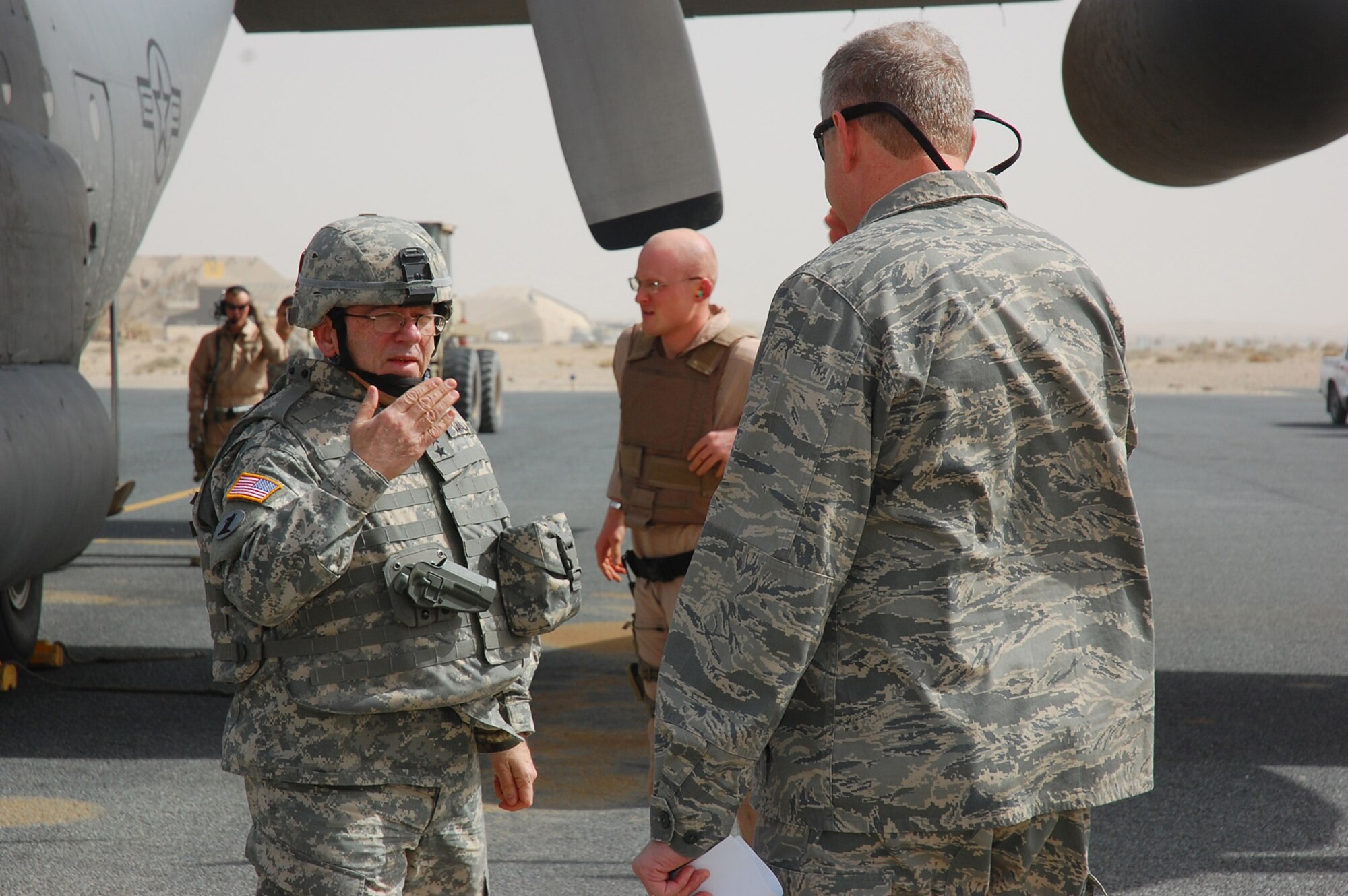 SOUTHWEST ASIA -- Lieutenant Col. Thomas Saxe (right), 386th Expeditionary Operations Group deputy commander, salutes U.S. Army Maj. Gen. Francis Vavala after arriving at a Southwest Asia an air Feb. 21, 2008. General Vavala is the adjutant general for the Delaware National Guard and is responsible for providing the State of Delaware and the United States with a ready force of citizen Soldiers and Airmen, equipped and trained to respond to any contingency, natural or manmade. The stop capped off a five day tour through the deployed area of responsibility where Guardsmen from Delaware are assigned. (U.S. Air Force photo/ Staff Sgt. Patrick Dixon)