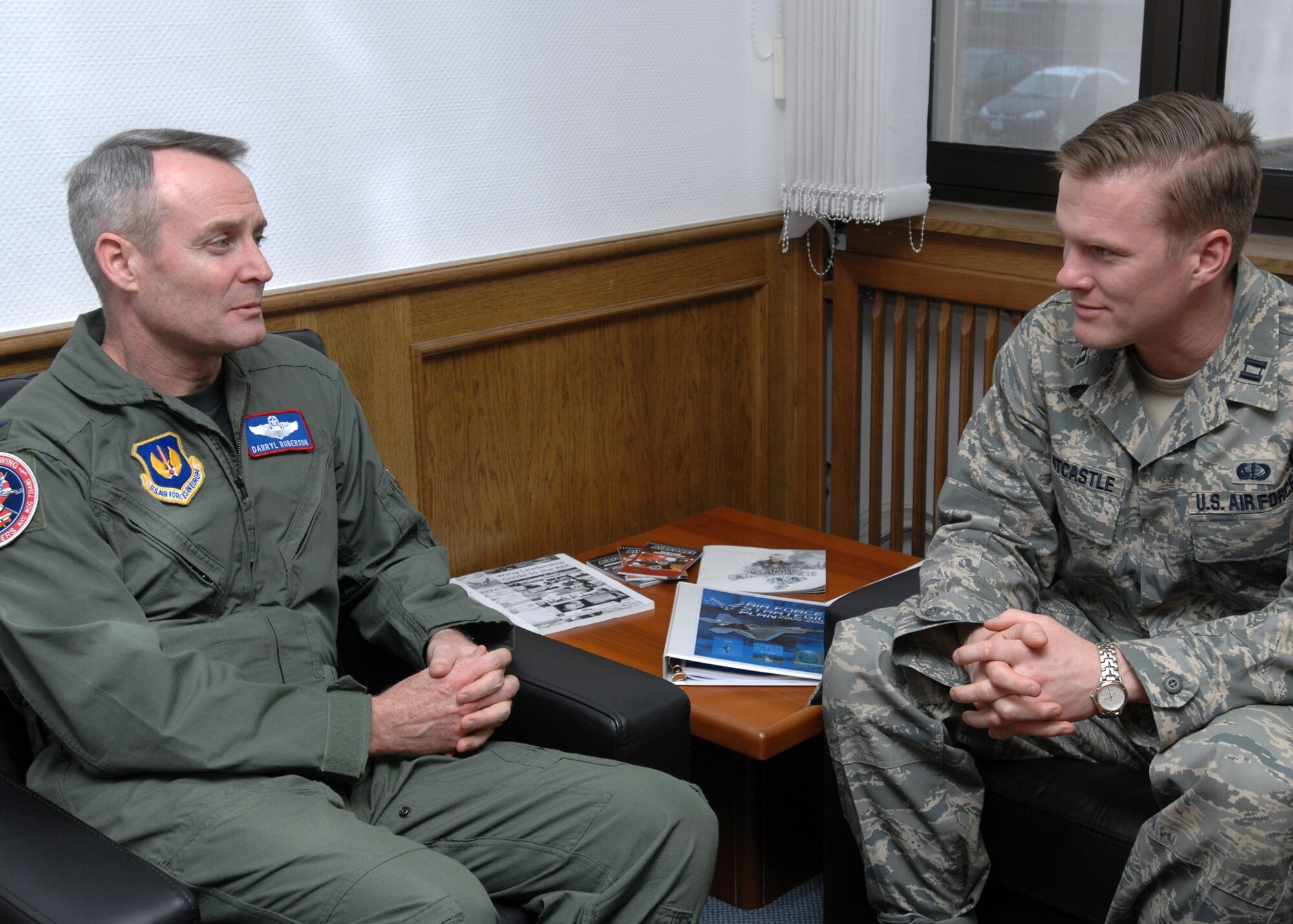 SPANGDAHLEM AIR BASE, Germany – Capt. Matt Mountcastle, 52nd Services Squadron, talks with Col. Darryl Roberson, 52nd Fighter Wing commander, Feb. 20, 2008. Captain Mountcastle spent the day with Colonel Roberson as part of the Commander’s Shadow program. The captain is a native of Santa Ana, Calif. (U.S. Air Force photo/Staff Sgt. Chris Mills)