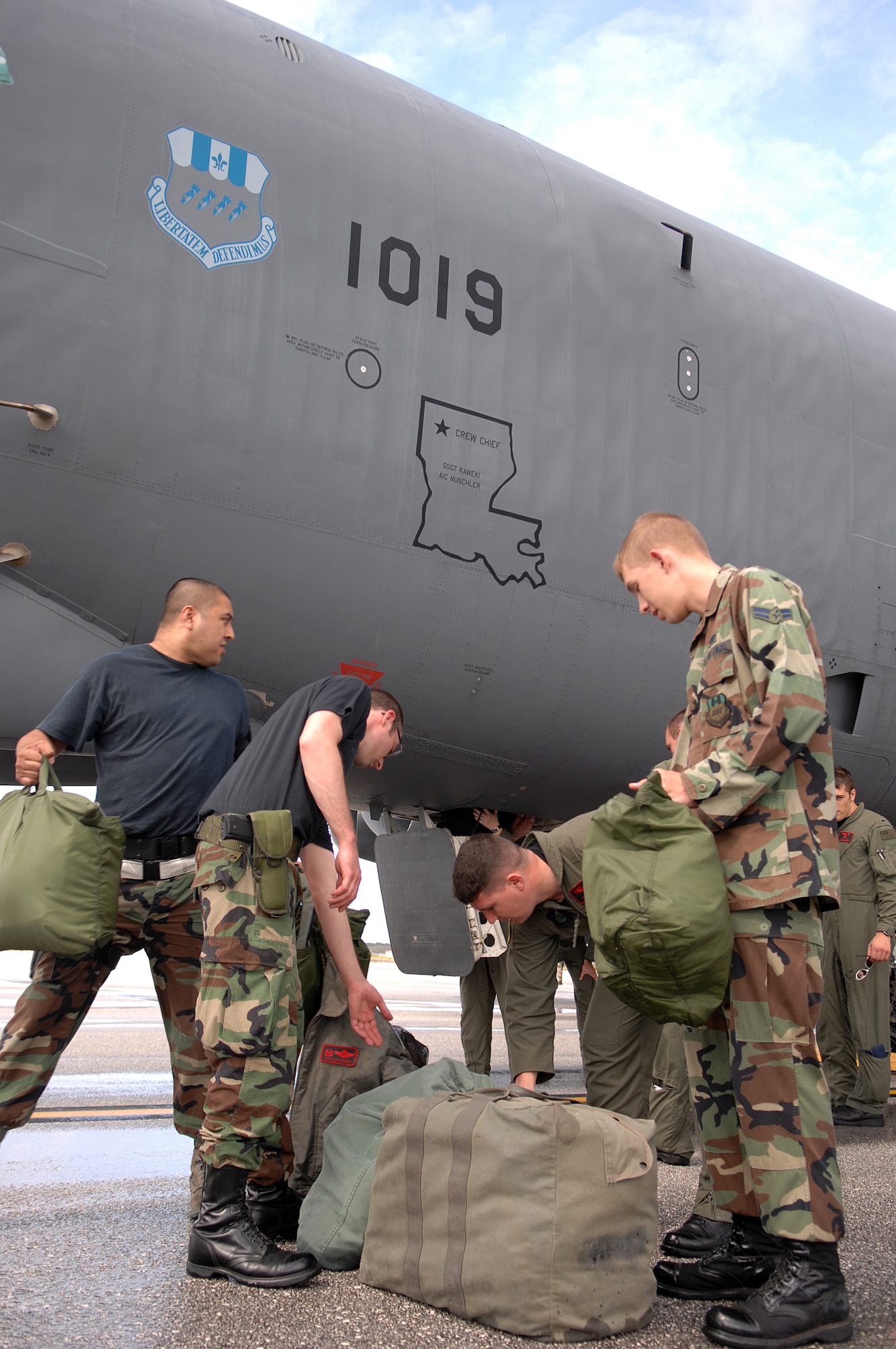 Andersen AFB, Guam -- Airmen help unload a B-52 Stratofortress bomber  from the 96th Expeditionary Bomb Squadron after arriving on Andersen AFB. The rotating bomber units promote security and stability in the region as well as provide unique aircrew training opportunities. The 96th EBS is deployed here from Barksdale AFB, La.
(U.S. Air Force Photo By Staff Sgt. Vanessa Valentine) 