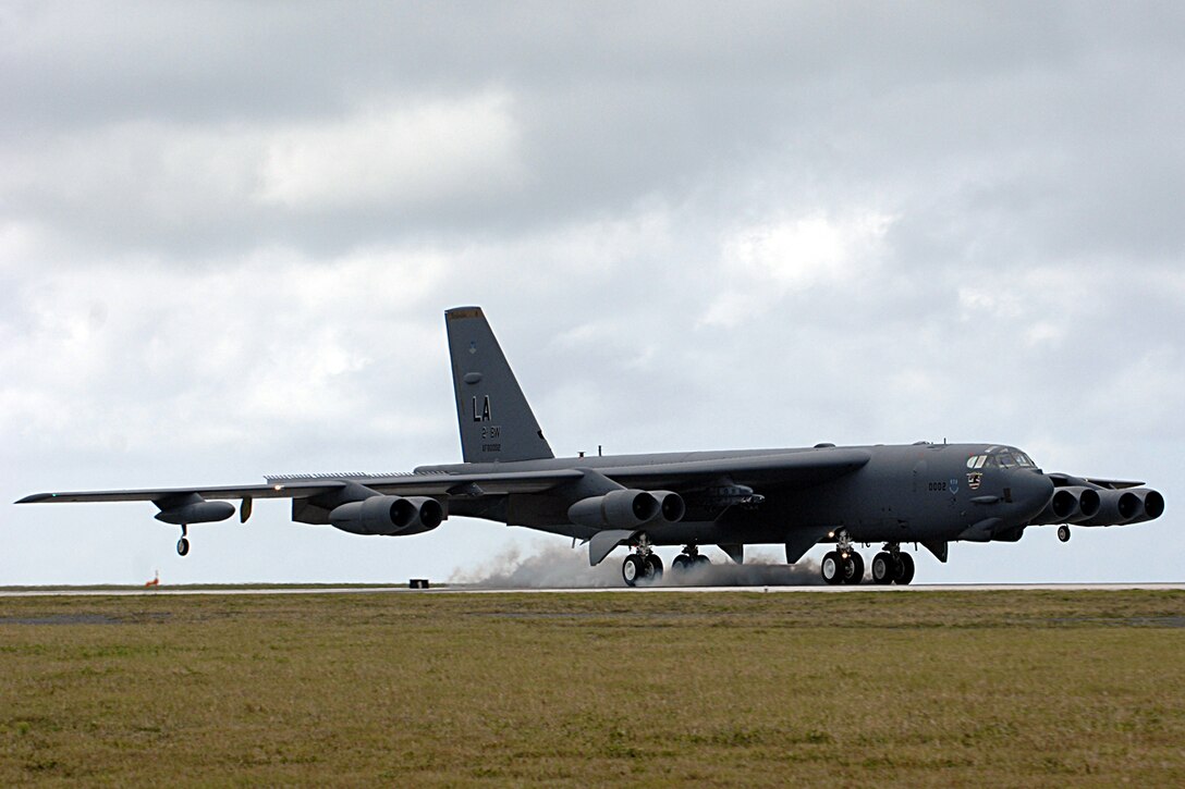 Andersen AFB, Guam -- A B-52 Stratofortress bomber  from the 96th Expeditionary Bomb Squadron lands on Andersen AFB. The rotating bomber units promote security and stability in the region as well as provide unique aircrew training opportunities. The 96th EBS is deployed here from Barksdale AFB, La.
(U.S. Air Force Photo By Staff Sgt. Vanessa Valentine) 