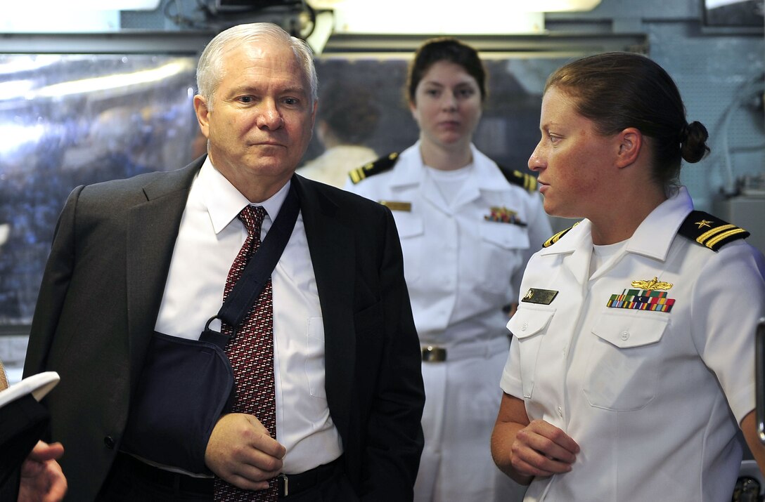 Defense Secretary Robert M. Gates receives a tour of the engineering room of the USS Russell by Navy LT. Courtney Minetree, chief engineer, while onboard the ship in Pearl Harbor, Hawaii, on Thursday, Feb. 21, 2008.  