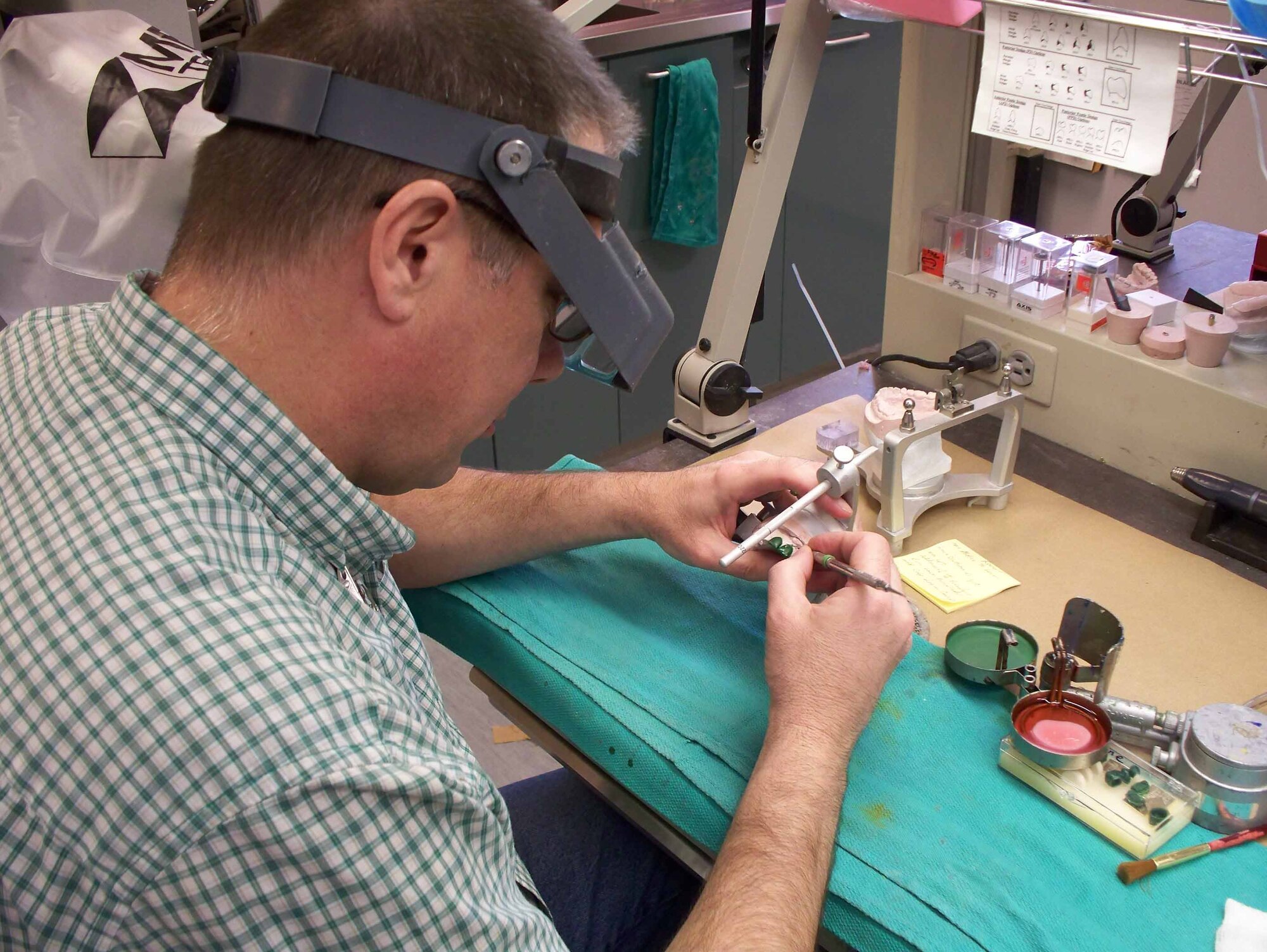Mark Cochraine works on a model for a crown.  (Courtesy photo)
