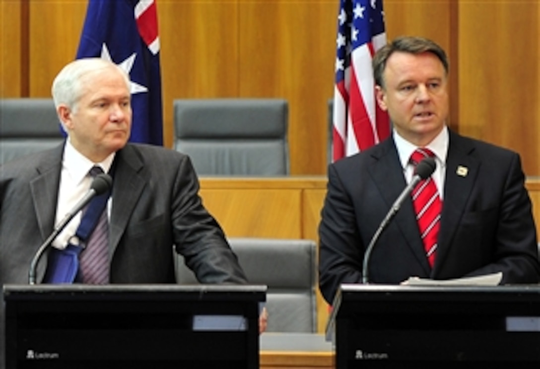 U.S. Secretary of Defense Robert M. Gates, left, and Australian Minister of Defense Joel Fitzgibbon answer questions from the press during the Australian Ministerial held in Canberra, Australia, Feb. 23, 2008.