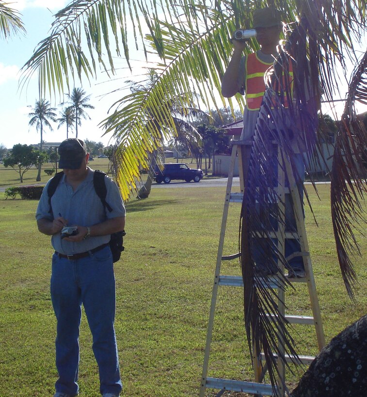 Two role players in a Vigilant Warrior exercise scenario film unauthorized footage of the flight line Feb. 12. (Courtesy photo)
