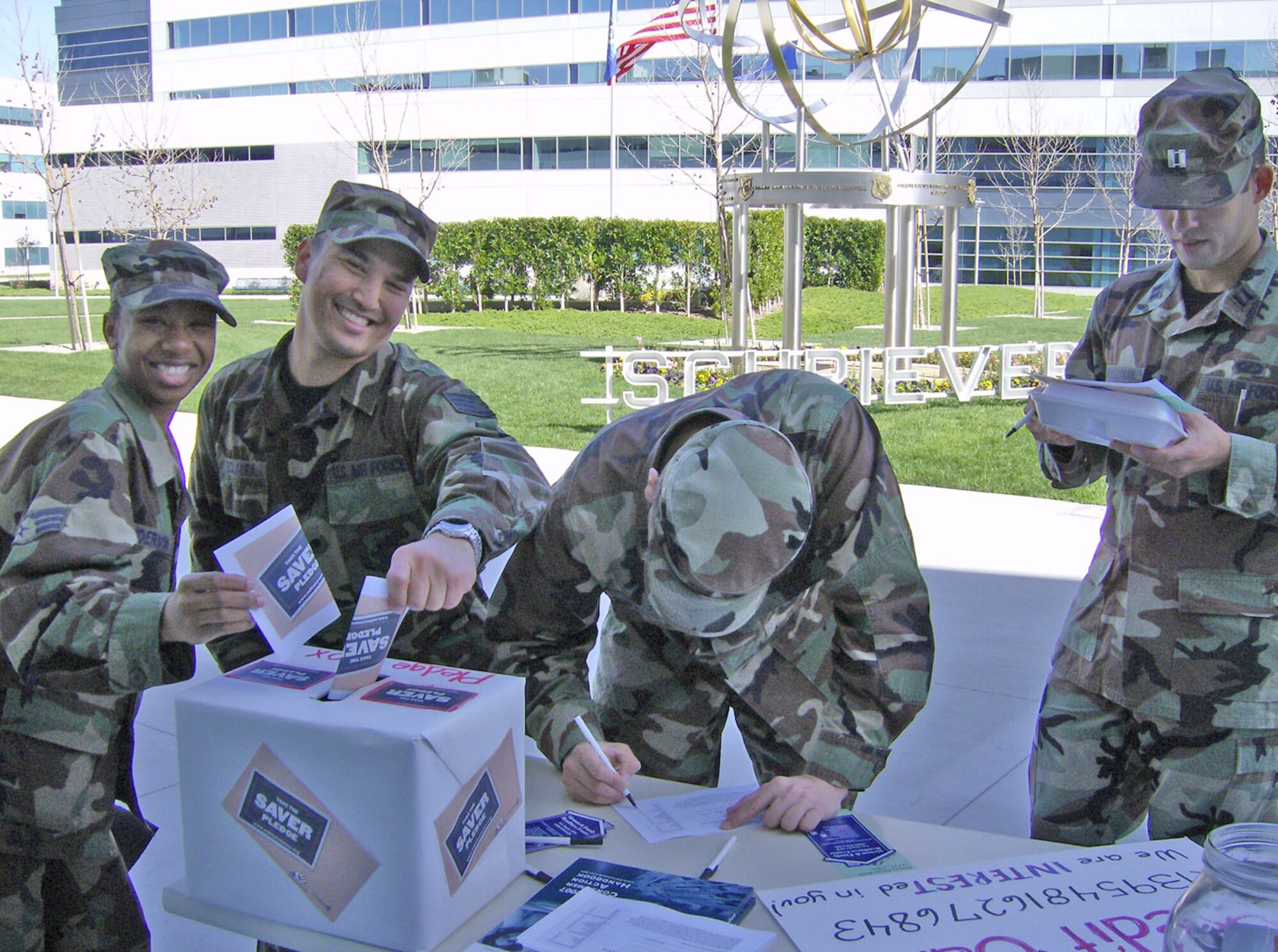 Military Saves Week 2008 kicked off at Los Angeles Air Force Base, Feb. 25.  The Airman & Family Readiness Center and Aerospace Federal Credit Union have teamed up to promote saving. Military members and civilians alike took the “Saver Pledge” to build wealth and not debt. Others showed their commitment to being a saver by cutting up their credit cards and adding them to the jar.  In addition to the exhibit on base and at the Aerospace Cafeteria, the A&FRC is hosting special financial workshops including Personal Financial Basics, Credit Report Review & Identity Theft, and Home Buying.  Call the A&FRC for more information at 310-653-5428 or go to www.militarysaves.org to take the Saver Pledge.