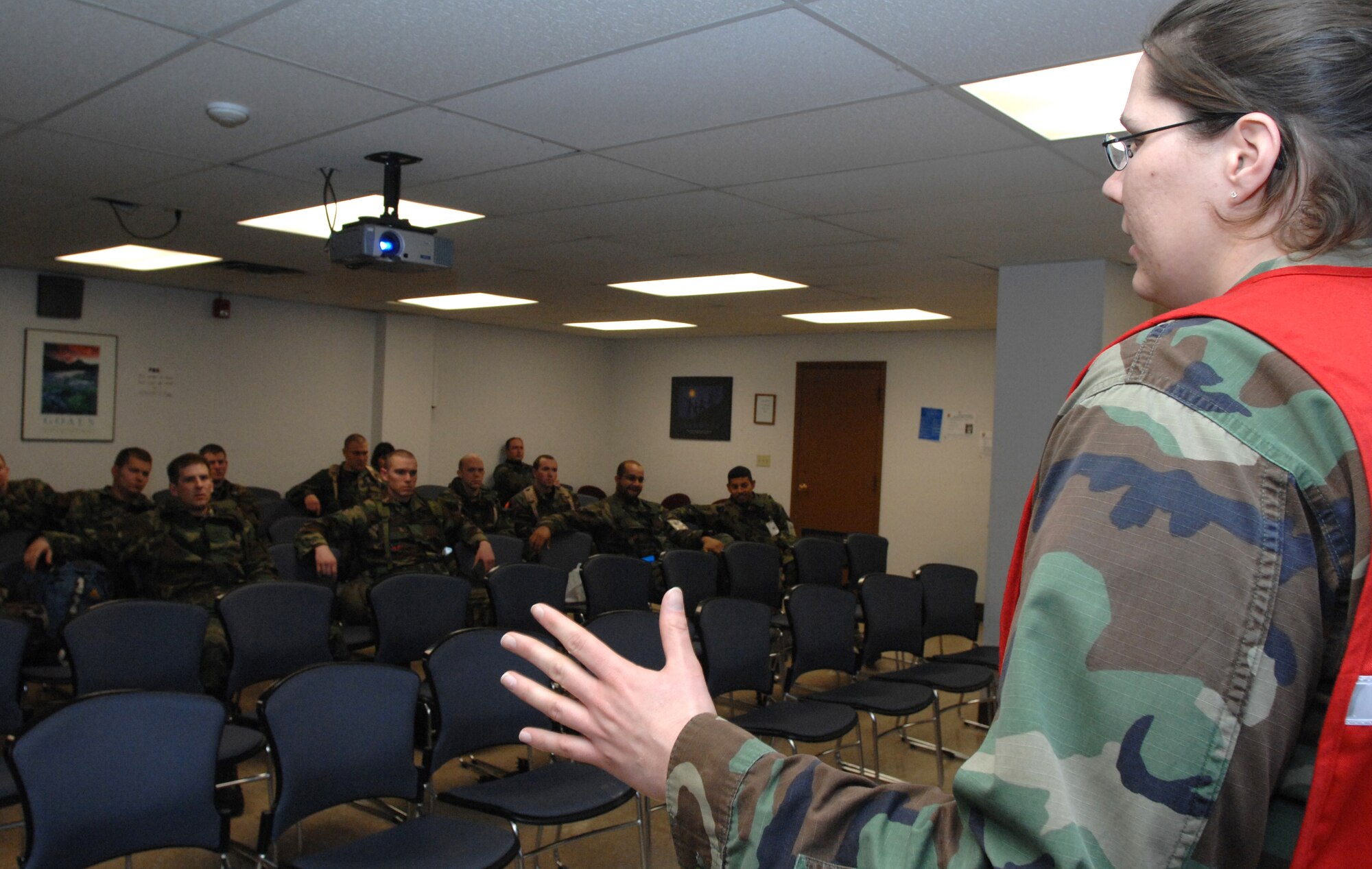 MOUNTAIN HOME AIR FORCE BASE, Idaho — Capt. Heidi Adams, 366th Fighter Wing Legal Office assistant staff judge advocate, performs the legal briefing for the Airmen processing to deploy during Exercise Sharpshooter 08-04 Feb. 25. The 366th Fighter Wing conducts exercises to prepare personnel and equipment for the upcoming March 2008 Operational Readiness Inspection. (U.S. Air Force photo/ Airman 1st Class Stephany Miller)