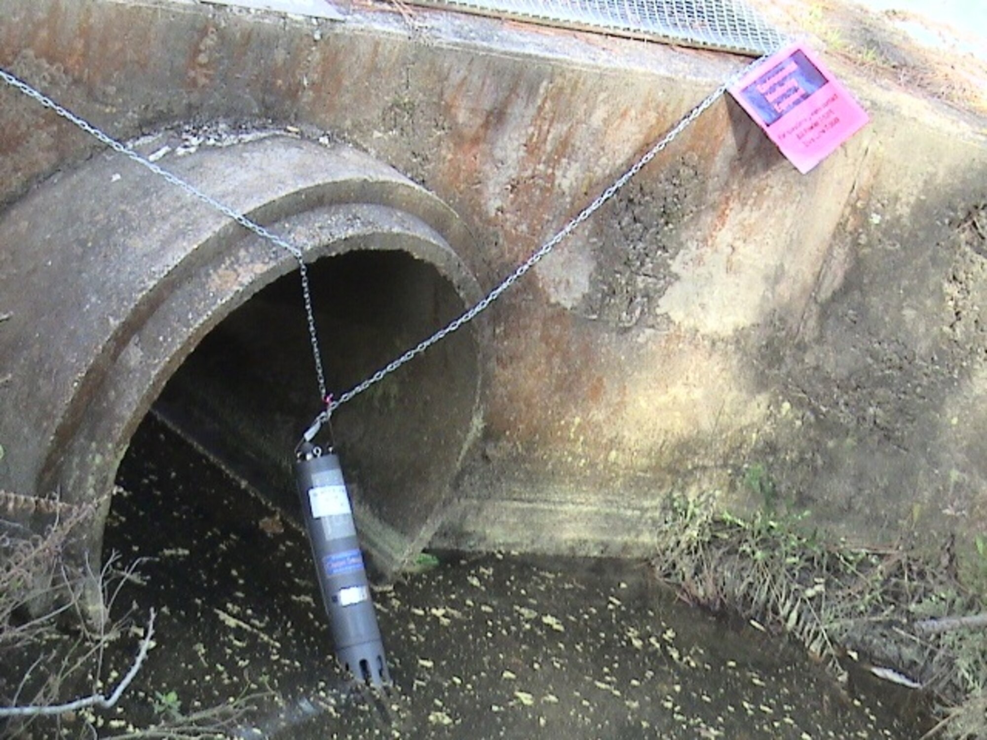 MOODY AIR FORCE BASE, Ga. -- Storm-water monitoring devices have been placed in six drainage locations throughout the base.  Each device is labeled with a brightly-colored sign stating “environmental monitoring equipment,” to help identify them. For more information, call 23rd Civil Engineering Squadron at 257-1395 (courtesy photo)
