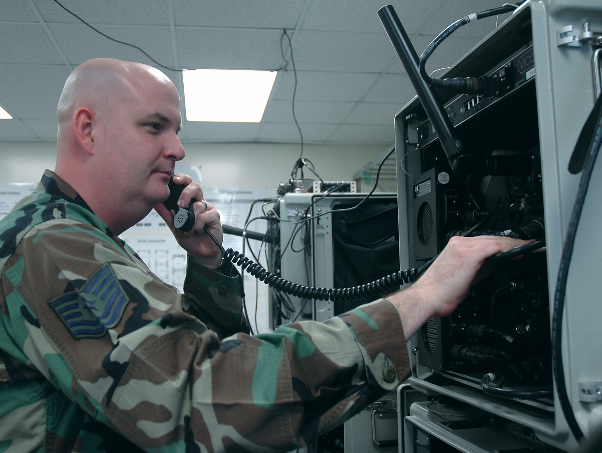 Tech. Sgt. Dan Alford, 919th Communications Squadron radio communications systems craftsman, performs radio systems checks with airborne radio operators. He is his unit's deployment manager and personal wireless communications systems manager. In his civilian job, he is a telecommunications specialist at Eglin Air Force Base. Off duty, he enjoys target shooting, playing music and spending time with his family. He is this month's Sharp Troop. (U.S. Air Force Photo\Jasmine DeNamur)
