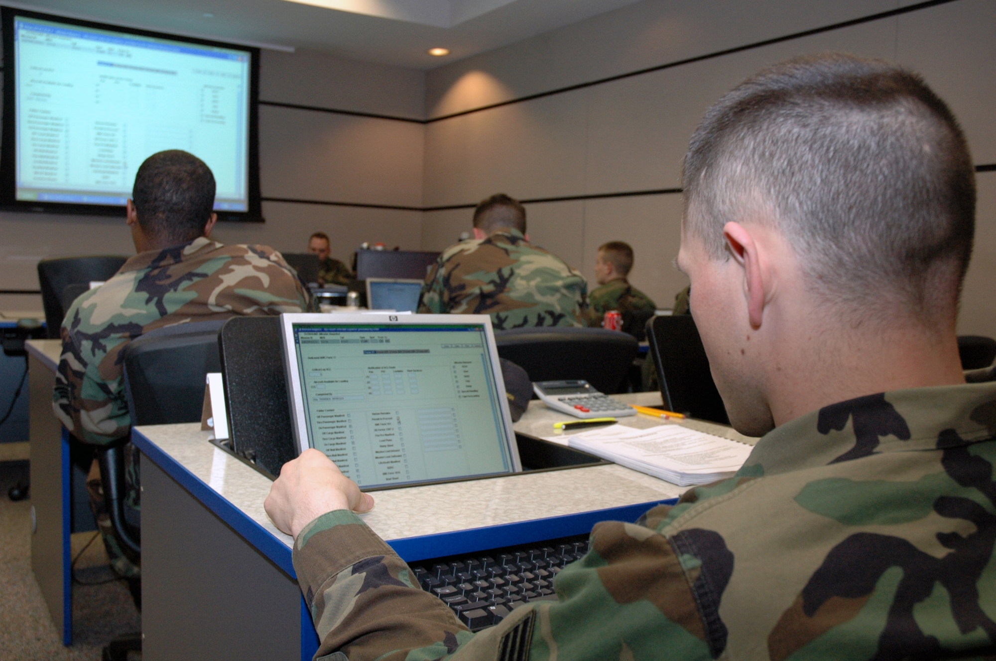 Students in the U.S. Air Force Expeditionary Center's Aerial Port Operations Course 2008E work on their computers in the classroom inside the Center on Fort Dix, N.J., Feb. 20, 2008.  The course, taught by the Center's Mobility Operations School Air Transportation Branch, teaches Airmen in the Air Force air transportation career field subject areas such as air freight, passenger service, air terminal operations center, and higher headquarters functions.  (U.S. Air Force Photo/Tech. Sgt. Scott T. Sturkol)