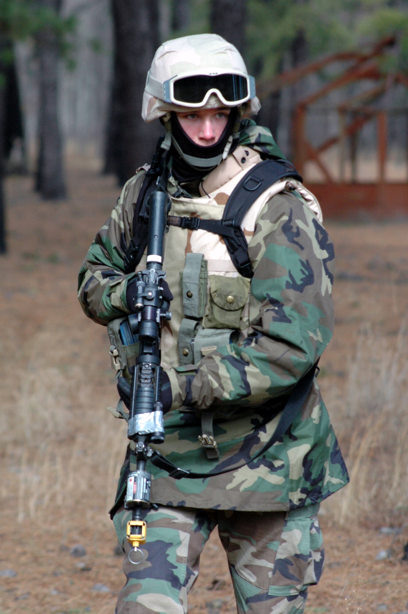 Airman 1st Class Justin Trammel, from the 569th U.S. Forces Police Squadron, Vogelweh Air Base, Germany, and a student in the Air Force Phoenix Warrior Training Course 08-3, practices a dismounted patrol scenario during training on a range Feb. 20, 2008, on Fort Dix, N.J.  The course is taught by the U.S. Air Force Expeditionary Center's Expeditionary Operations School and 421st Combat Training Squadron and prepares security forces Airmen for upcoming deployments.  (U.S. Air Force Photo/Tech. Sgt. Scott T. Sturkol)
