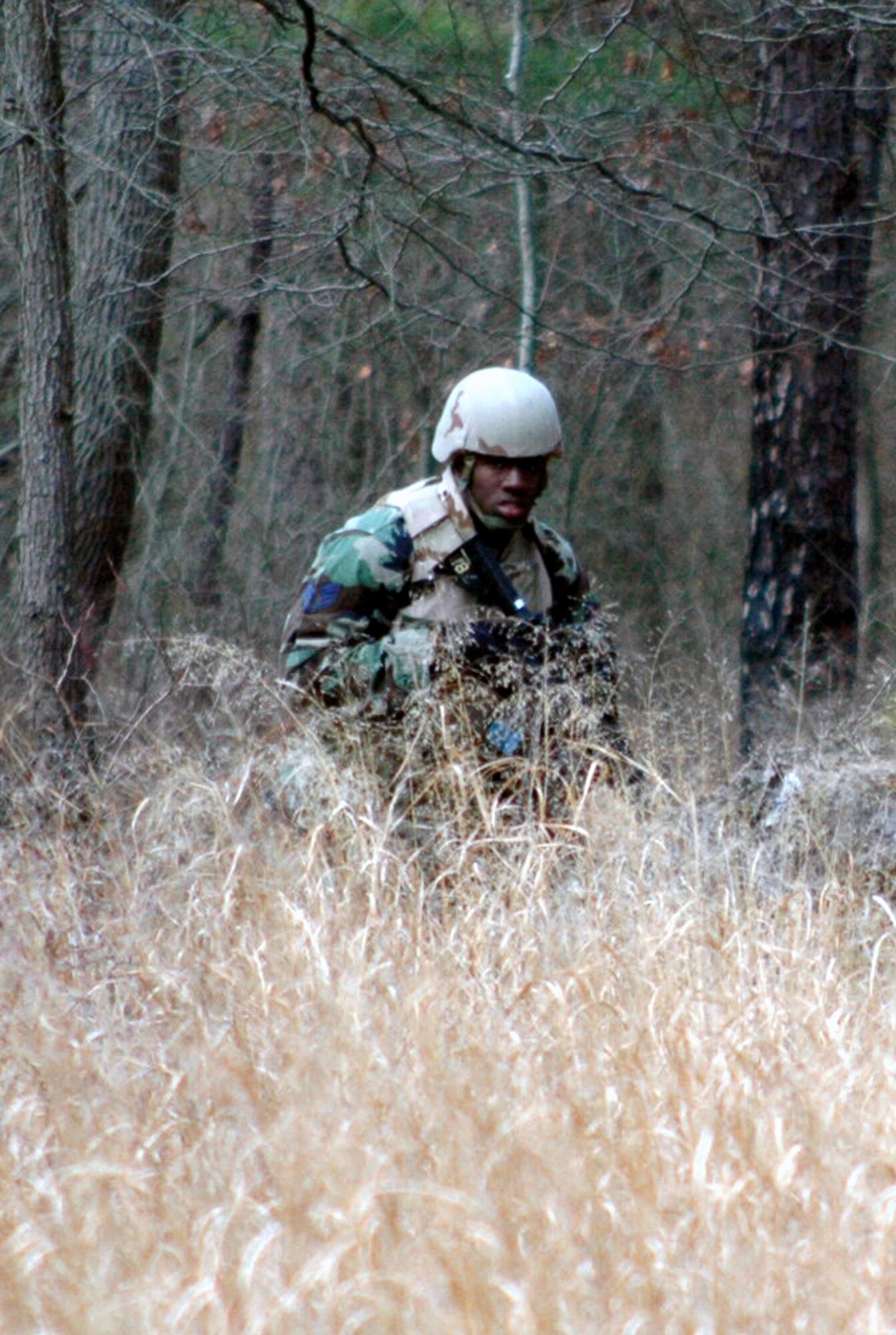 Staff Sgt. Robert Graves, from the 569th U.S. Forces Police Squadron, Vogelweh Air Base, Germany, and a student in the Air Force Phoenix Warrior Training Course 08-3, practices a dismounted patrol scenario during training on a range Feb. 20, 2008, on Fort Dix, N.J.  The course is taught by the U.S. Air Force Expeditionary Center's Expeditionary Operations School and 421st Combat Training Squadron and prepares security forces Airmen for upcoming deployments.  (U.S. Air Force Photo/Tech. Sgt. Scott T. Sturkol)