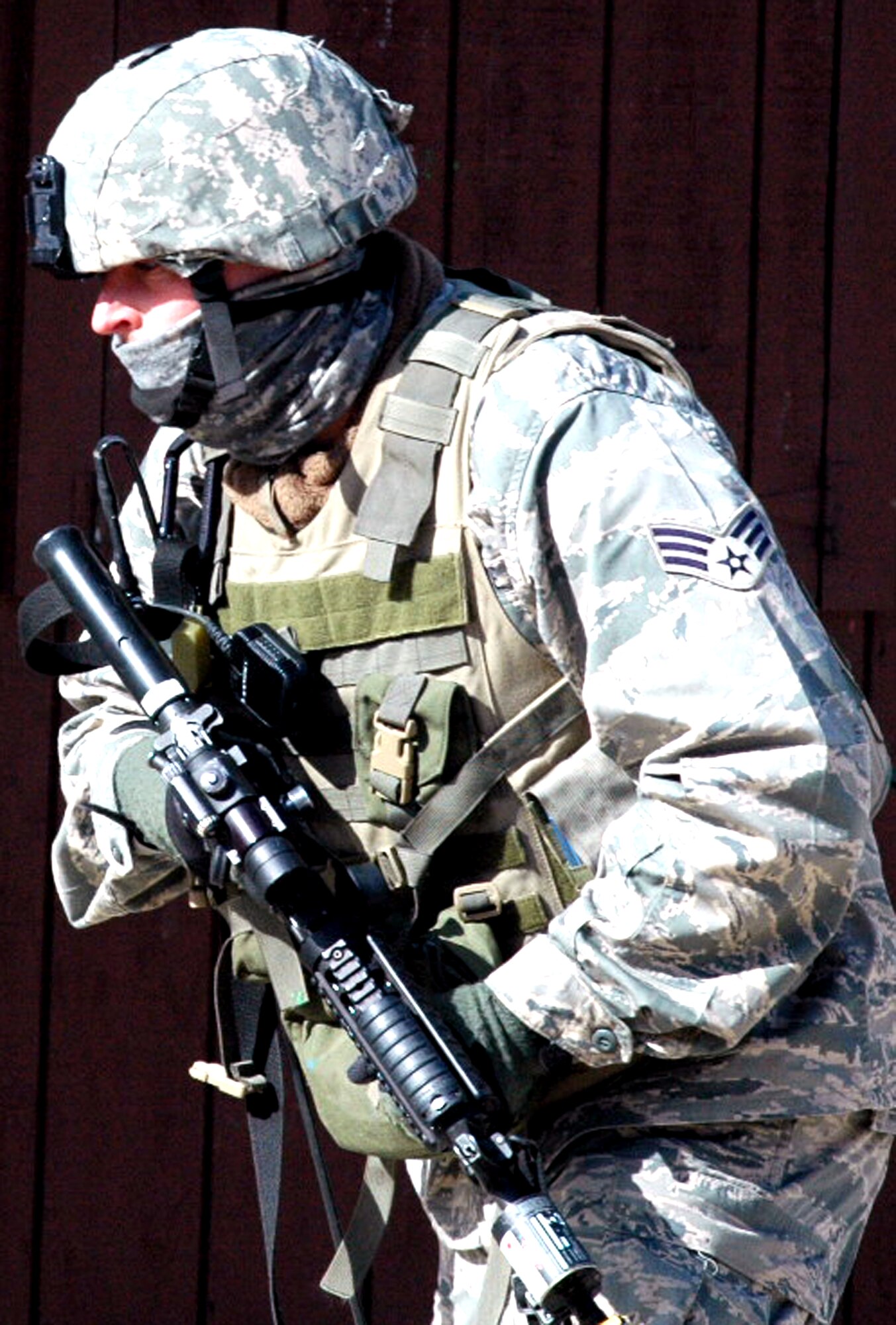 Senior Airman Michael Cooper, 355th Security Forces Squadron, Davis-Monthan Air Force Base, Ariz., a student in the Air Force Phoenix Warrior Training Course 08-3, participates in a military operations in urban terrain scenario for training for the course Feb. 20, 2008, on a range on Fort Dix, N.J.  The course is taught by the U.S. Air Force Expeditionary Center's Expeditionary Operations School and 421st Combat Training Squadron and prepares security forces Airmen for upcoming deployments.  (U.S. Air Force Photo/Tech. Sgt. Scott T. Sturkol)