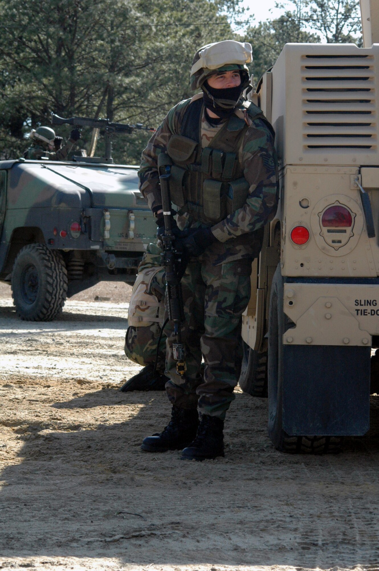 Tech. Sgt. David Barry, 721st Security Forces Squadron, Cheyenne Mountain Air Force Station, Colo, and a student in the Air Force Phoenix Warrior Training Course 08-3, takes up a defensive position during a scenario for training for the course Feb. 20, 2008, on a range on Fort Dix, N.J.  The course is taught by the U.S. Air Force Expeditionary Center's Expeditionary Operations School and 421st Combat Training Squadron and prepares security forces Airmen for upcoming deployments.  (U.S. Air Force Photo/Tech. Sgt. Scott T. Sturkol)