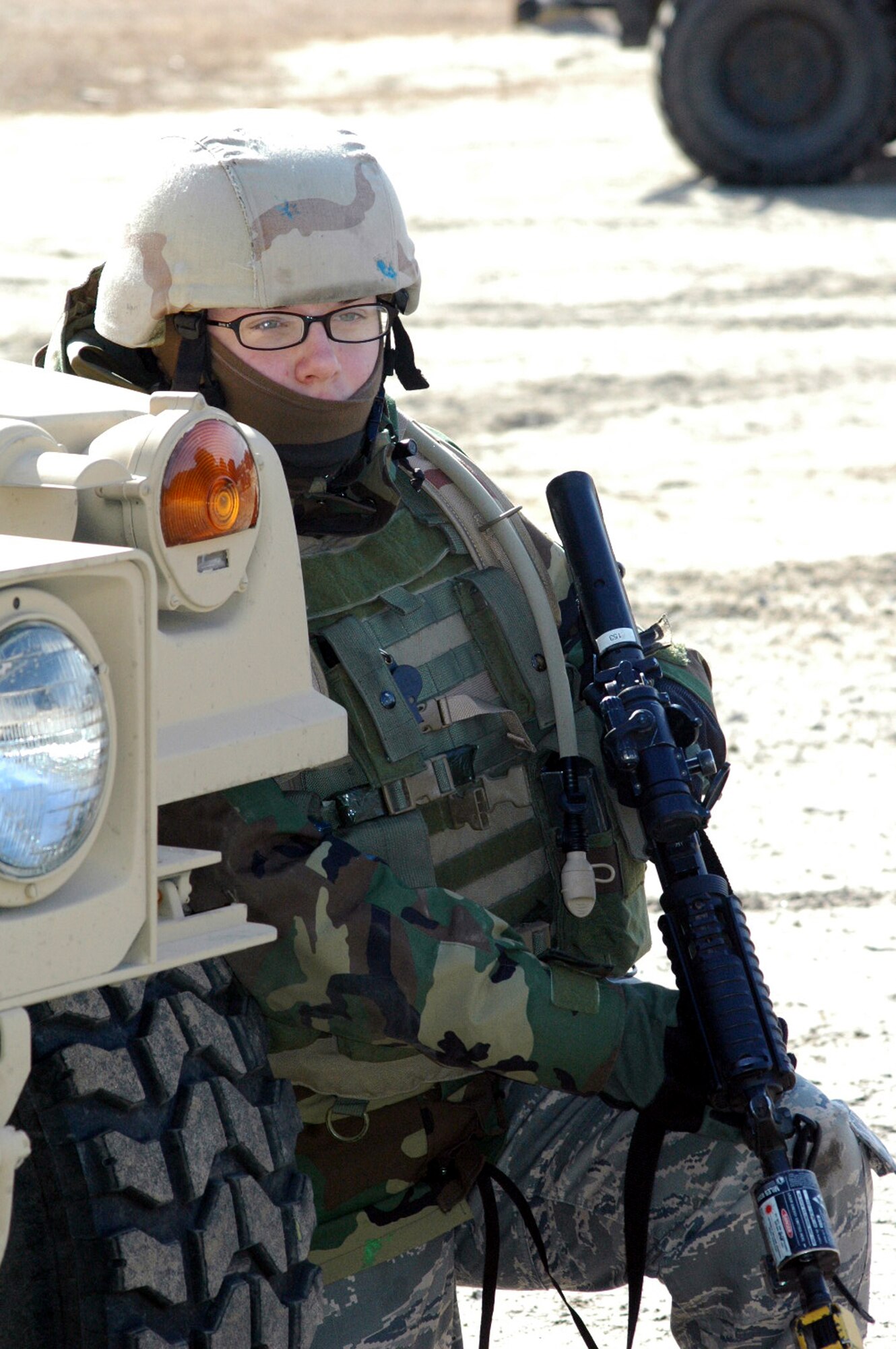 Airman 1st Class Jamie Elrod, 49th Security Forces Squadron, Hollomon Air Force Base, N.M., a student in the Air Force Phoenix Warrior Training Course 08-3, takes up a defensive position during a scenario for training for the course Feb. 20, 2008, on a range on Fort Dix, N.J.  The course is taught by the U.S. Air Force Expeditionary Center's Expeditionary Operations School and 421st Combat Training Squadron and prepares security forces Airmen for upcoming deployments.  (U.S. Air Force Photo/Tech. Sgt. Scott T. Sturkol)