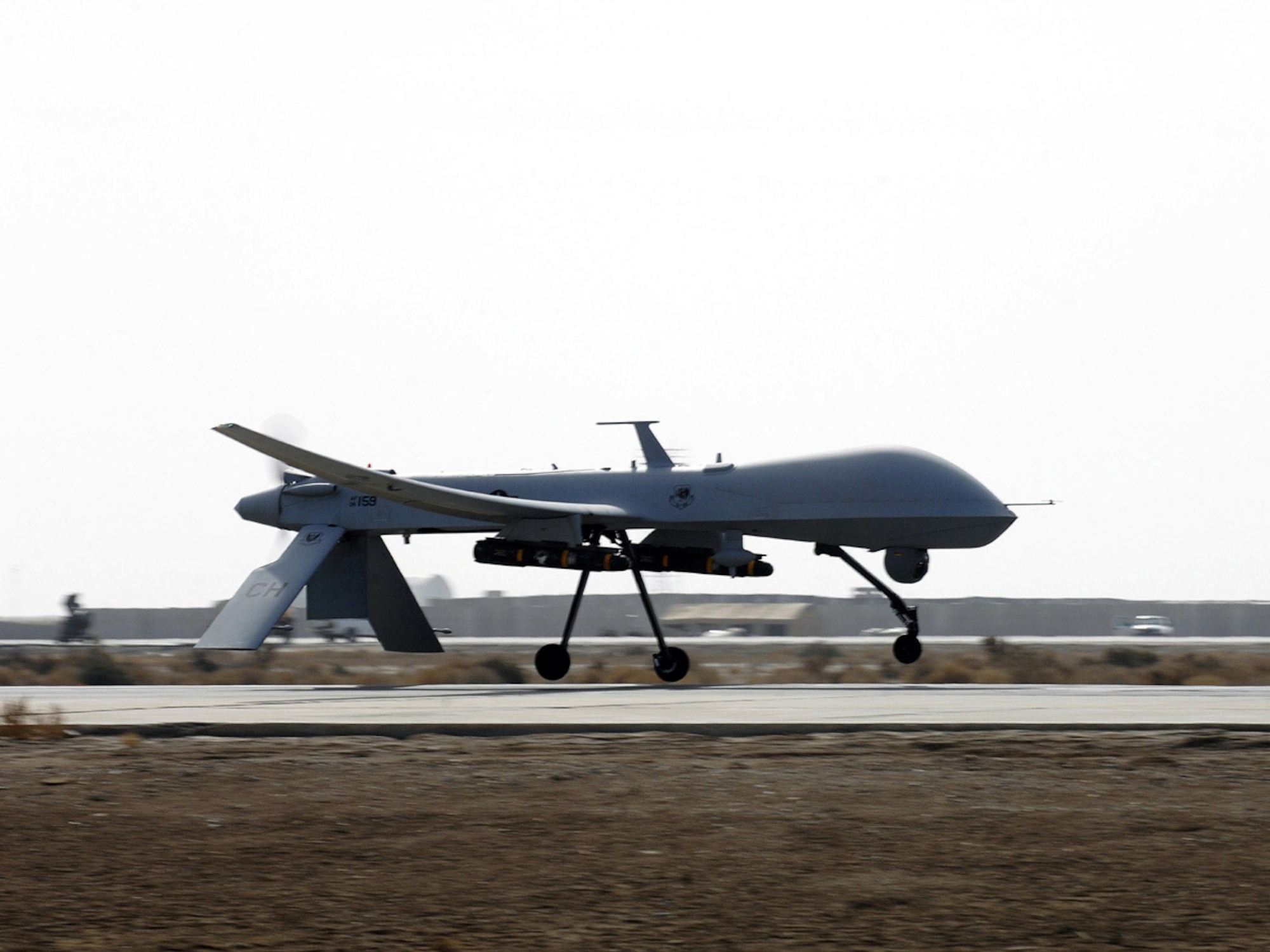 An Air Force MQ-1 Predator from the 361st Expeditionary Reconnaissance Squadron takes off from Ali Base, Iraq, in support of Operation Iraqi Freedom. The Predator is a medium-altitude, long-endurance, remotely piloted aircraft capable of conducting armed reconnaissance. (U.S. Air Force photo/Airman 1st Class Jonathan Snyder) 

